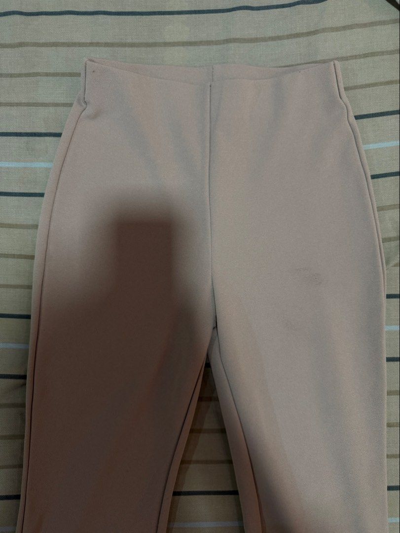 H&M Beige Flared Leggings (Category: Other Bottoms) located in Valenzuela. Submitted by rachmcadams (Listing ID 1462501156, Image 2). Description: • 100% original (mall bought) • Issue: Stains which I think are removable (see 5th photo) • Fits XS-S P.S. Last photo is the same item in color black. RFS: Decluttering What you see is what you get! .