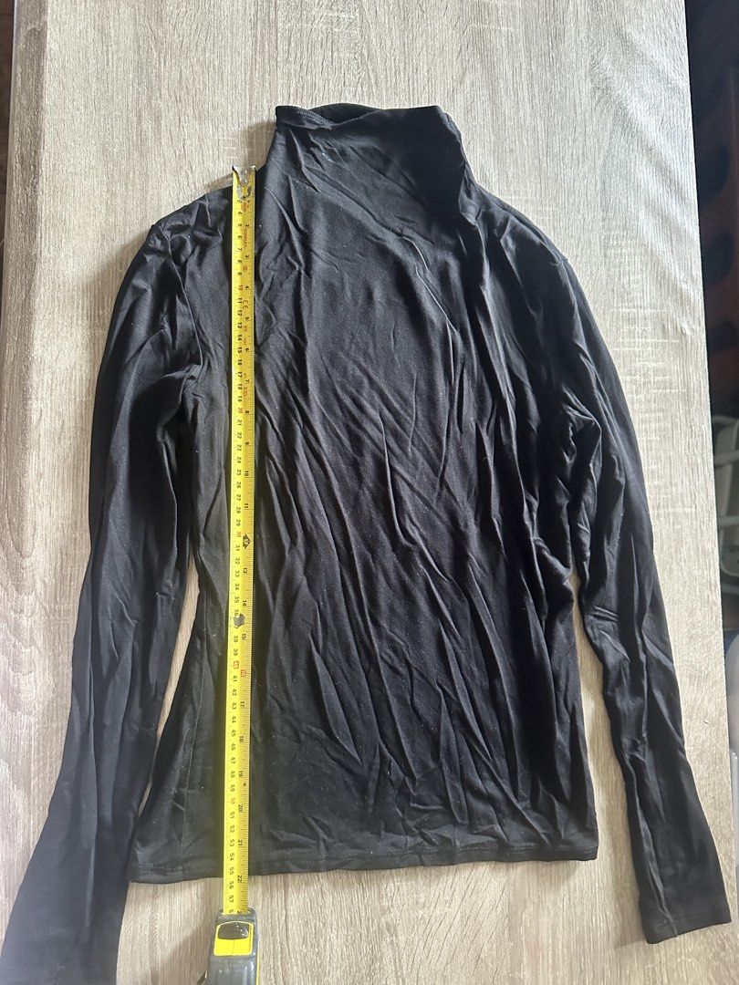H&M Black Long Sleeve Turtleneck Top Size S (Category: Longsleeves) located in Cainta. Submitted by thingsfromerika (Listing ID 1462473843, Image 2). Description: - Basic black long sleeve turtleneck from H&M - Soft and stretchy material for comfort - Perfect for layering or wearing on its own - Easy to pair with any outfit - Approximately 22 inches in length.