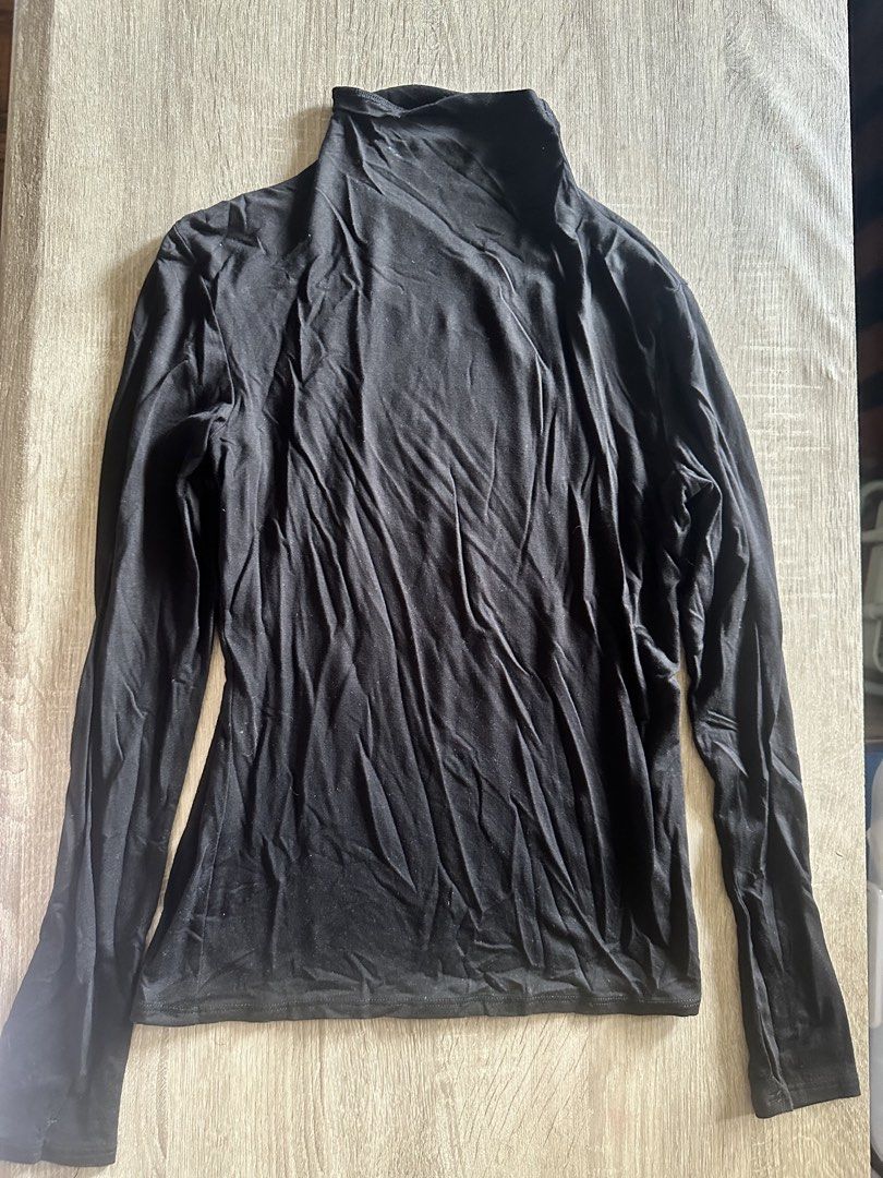 H&M Black Long Sleeve Turtleneck Top Size S (Category: Longsleeves) located in Cainta. Submitted by thingsfromerika (Listing ID 1462473843, Image 1). Description: - Basic black long sleeve turtleneck from H&M - Soft and stretchy material for comfort - Perfect for layering or wearing on its own - Easy to pair with any outfit - Approximately 22 inches in length.