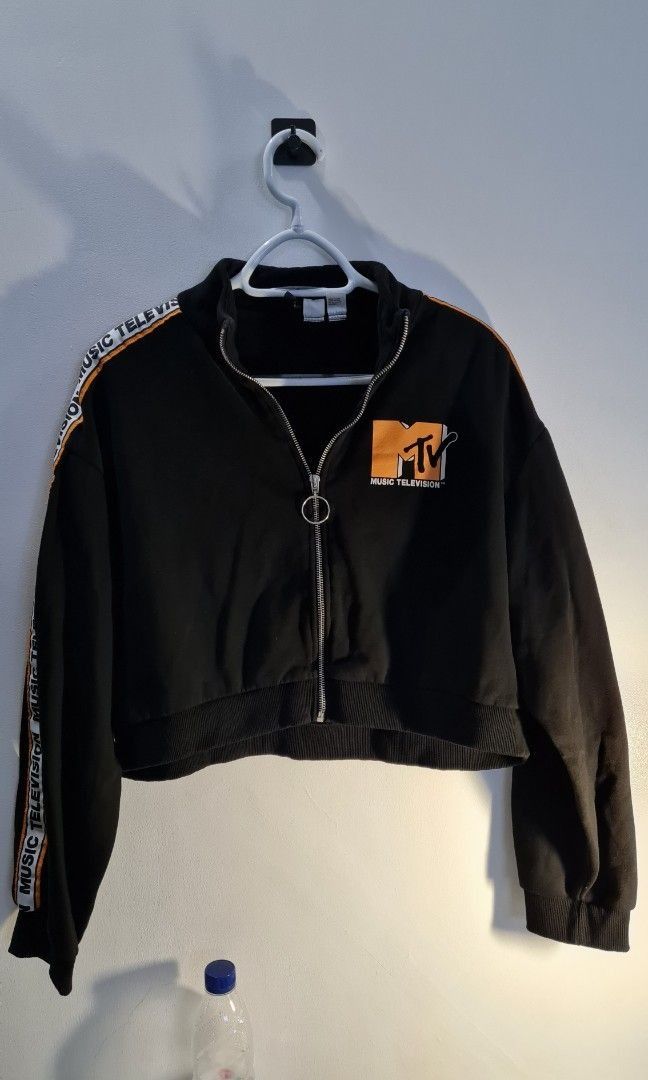 H&M MTV & Pepsi Cropped Zip-Up Jackets (Category: Coats, Jackets and Outerwear) located in Cavite. Submitted by greysieg (Listing ID 1462659815, Image 2). Description: - Two cropped zip-up jackets, both size M. - Black jacket features MTV logo and 'Music Television' tape on sleeves. - White jacket features Pepsi logo and blue stripes. - Ideal for casual wear or a cool retro vibe. payment via GCash .