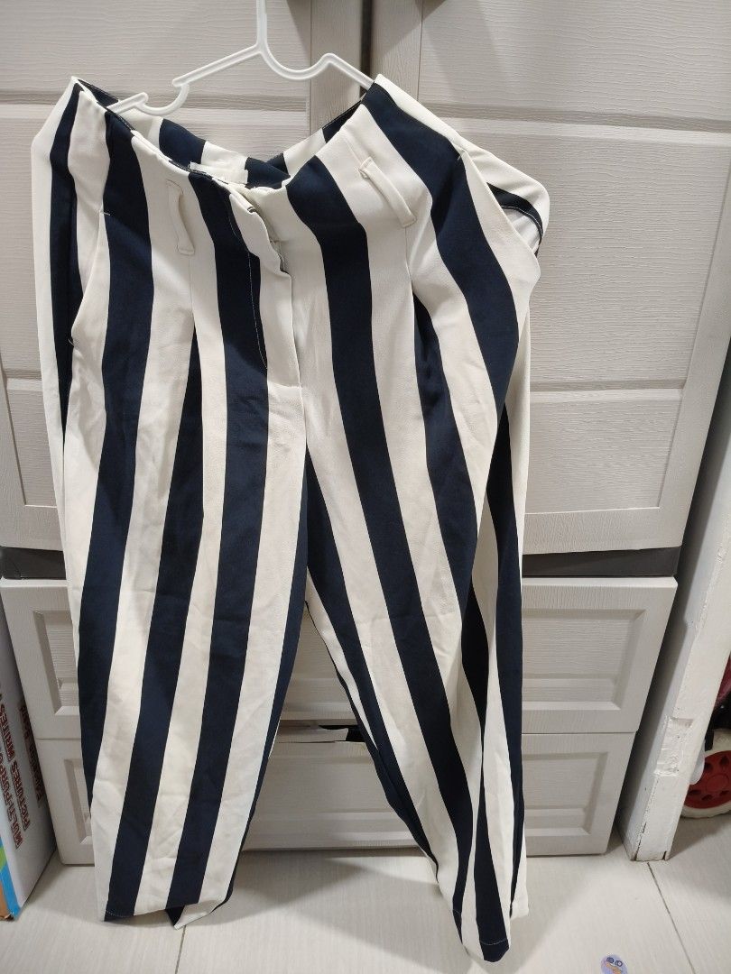 H&M Striped High Waisted Pants Size 4 (Category: Other Bottoms) located in Manila. Submitted by hellocaea010894 (Listing ID 1462600663, Image 1). Description: - H&M Navy & White Striped Pants - High-waisted style - Button and zip closure - Straight leg cut - Perfect for casual or smart casual outfits - Easy to pair with various tops.