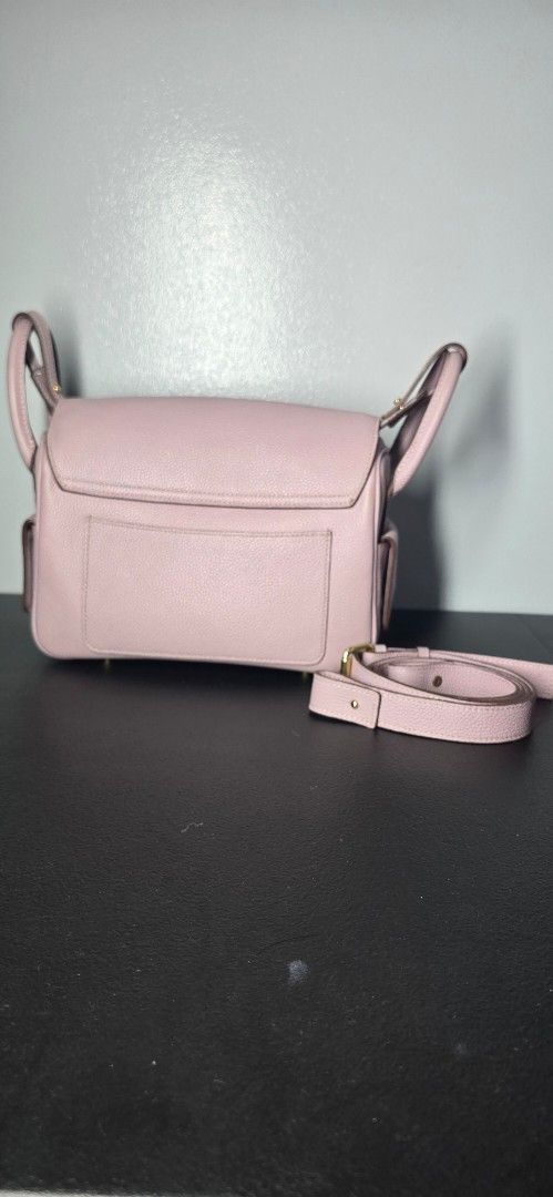 Holb genunine leather treasure (Category: Shoulder Bags) located in Manila. Submitted by chubbychic553 (Listing ID 1462642182, Image 3). Description: BRAND: HOUSE OF LITTLE BUNNY color: Taro Genuine Leather flaw: few discoloration (bluish) - Top handles and detachable shoulder strap - Gold hardware details - Four metal feet on the bottom ( few tarnishing) well taken cared with leather conditioner PHP 3500 location Tayuman Manila shipping via j&t,