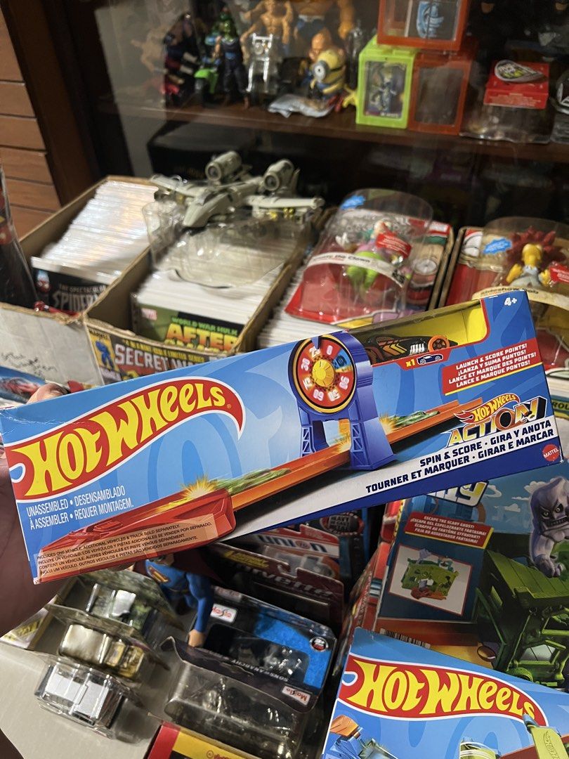 Hot wheels (Category: Vehicle & Diecast Models) located in Quezon City. Submitted by chloegbnsy (Listing ID 1462558249, Image 2). Description: The item shown in your hand is the Hot Wheels City Ghost Garage fold-out playset by Mattel..