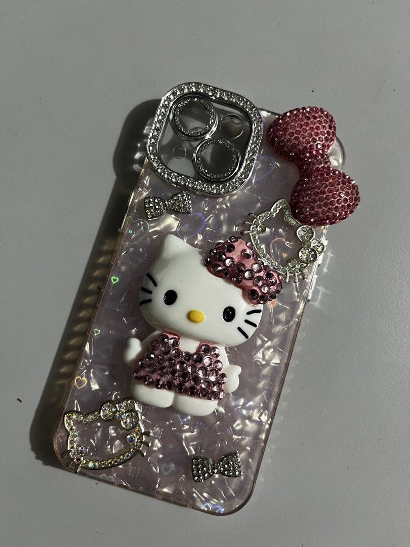 IPHONE 13 HELLO KITTY RHINESTONE PHONE CASE (Category: iPhone 13 Series) located in Makati City. Submitted by girlydy (Listing ID 1462647719, Image 1). Description: .