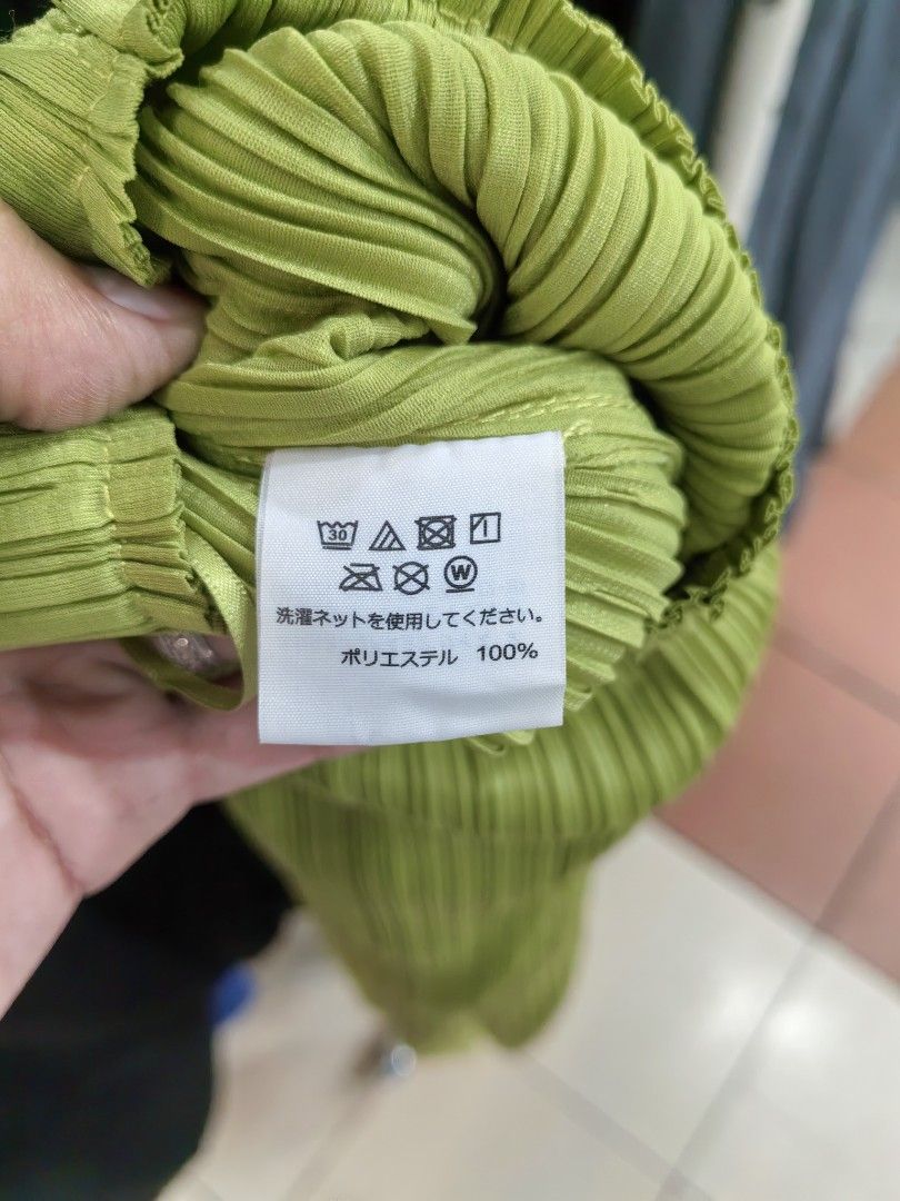 Issey Miyake Pleats Please Pants Size 2 Lime Green (Category: Other Bottoms) located in Batangas. Submitted by human.made (Listing ID 1462455838, Image 2). Description: - Brand: Issey Miyake - Style: Classic Pleats Please - Color: Lime Green - Size: 2 - Material: 100% Polyester - Origin: Made in Japan - Care: Easy care, follow tag instructions - Perfect for: Everyday wear - LEGIT/OFF.