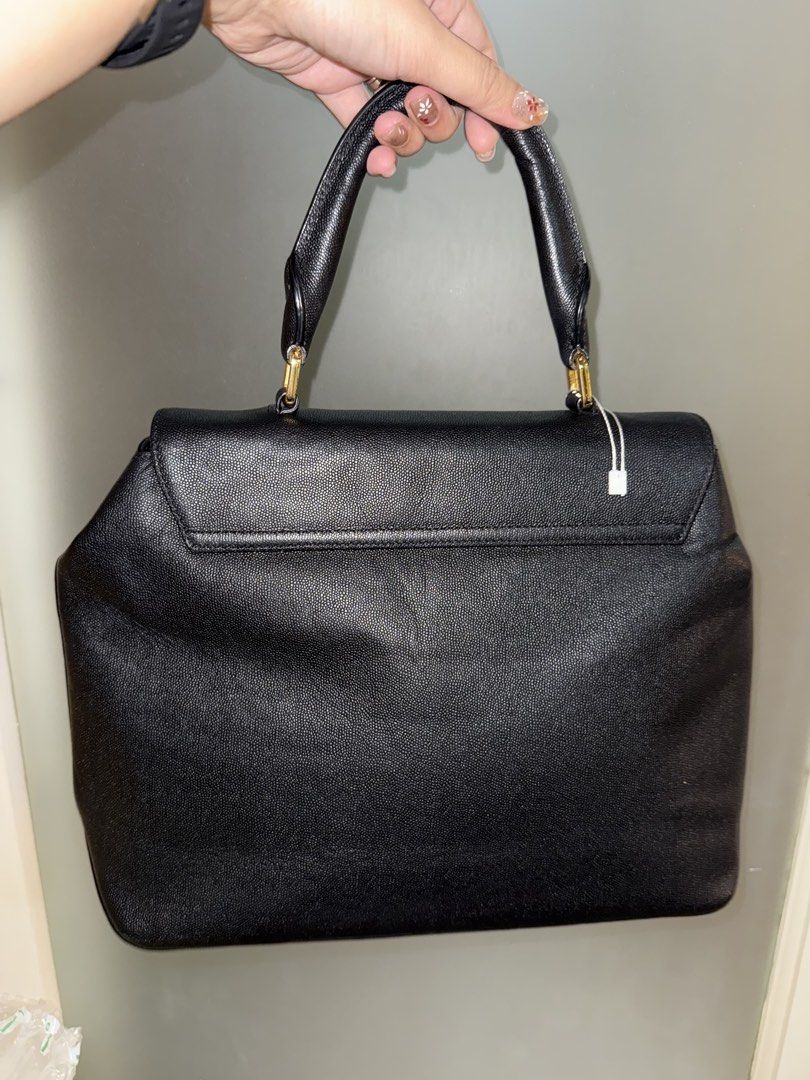 J. Estina Top Handle 2-way bag (Category: Shoulder Bags) located in Makati City. Submitted by amos411 (Listing ID 1462459247, Image 2). Description: Original J.Estina 2-way bag Size: Med to Large No issues or flaws RFS: decluterring, rarely used.