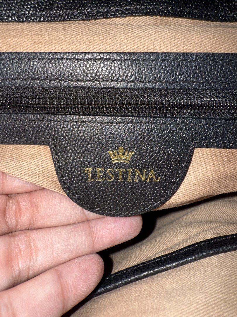 J. Estina Top Handle 2-way bag (Category: Shoulder Bags) located in Makati City. Submitted by amos411 (Listing ID 1462459247, Image 3). Description: Original J.Estina 2-way bag Size: Med to Large No issues or flaws RFS: decluterring, rarely used.