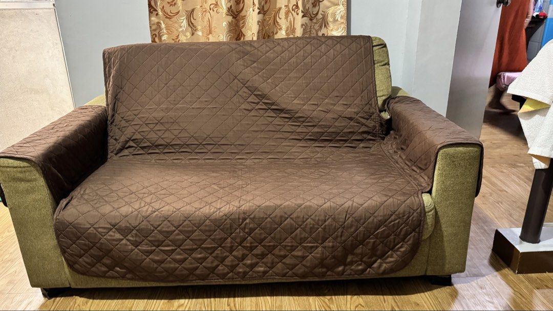 Japanese 2- SEATER SOFA - Brown (Category: Sofas) located in Manila. Submitted by janna.ali (Listing ID 1462600706, Image 2). Description: - Protect your sofa with this quilted cover. - Nice brown color. - Fits over arms and back. - Easy to put on and take off. - Keeps furniture safe from spills and wear. - Helps maintain a neat living room. - Measures approximately 70 inches wide..