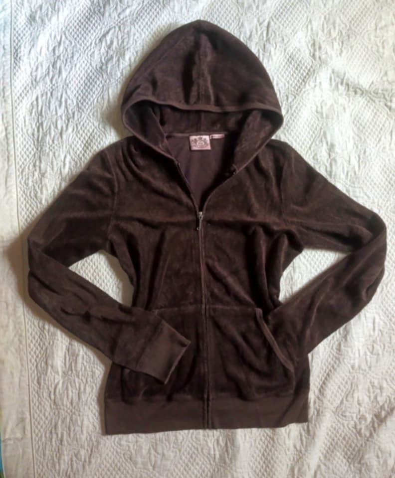 Juicy Couture Brown Velour tracksuit (Category: Sets or Coordinates) located in Manila. Submitted by kaloyyyyyy (Listing ID 1462478578, Image 1). Description: - Authentic Juicy Couture velour tracksuit set - Color: Deep Brown - Set includes: Zip-up hoodie and matching pants - Hoodie features: Pockets and hood - Pants feature: Drawstring waist - Super comfy and stylish for everyday wear.