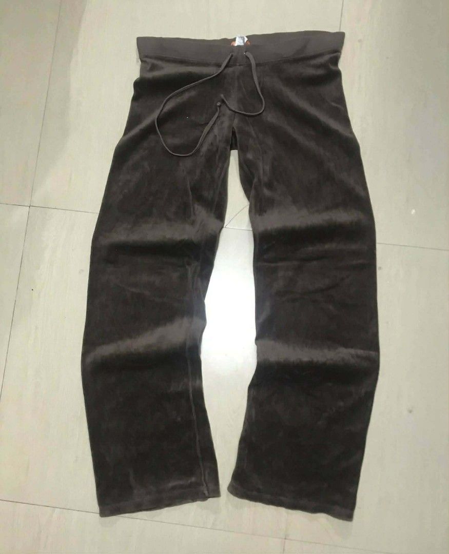 Juicy Couture Brown Velour tracksuit (Category: Sets or Coordinates) located in Manila. Submitted by kaloyyyyyy (Listing ID 1462478578, Image 2). Description: - Authentic Juicy Couture velour tracksuit set - Color: Deep Brown - Set includes: Zip-up hoodie and matching pants - Hoodie features: Pockets and hood - Pants feature: Drawstring waist - Super comfy and stylish for everyday wear.