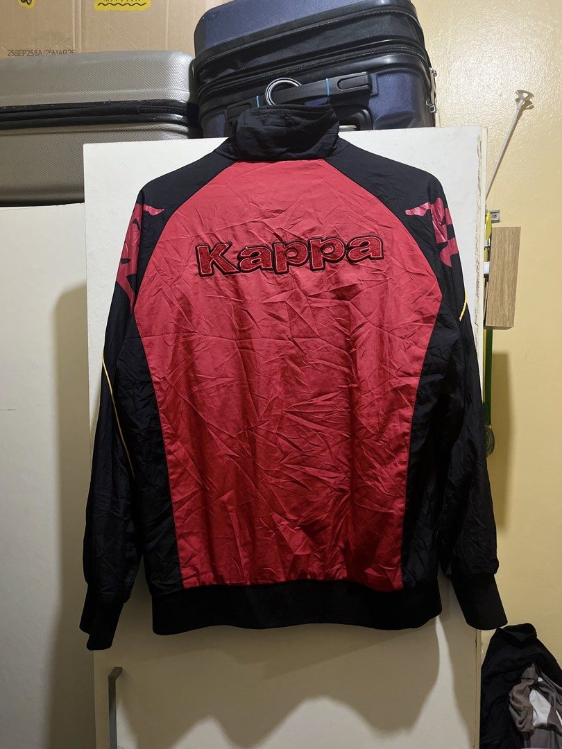 Kappa Track Jacket Red Black (Category: Coats, Jackets and Outerwear) located in Manila. Submitted by jezrathrift (Listing ID 1462673209, Image 3). Description: - Classic Kappa track jacket - Red and black colorway - Embroidered Kappa logo on chest - 'Kappa' text detail on back - Full zip closure - Ribbed cuffs and hem - Ideal for casual wear or sports.