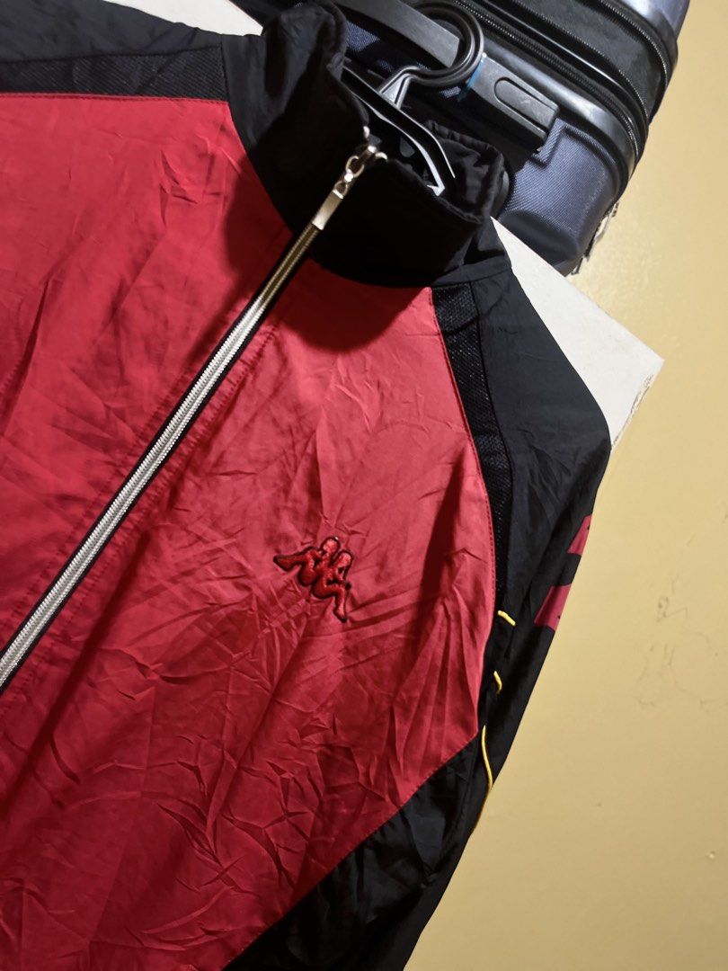 Kappa Track Jacket Red Black (Category: Coats, Jackets and Outerwear) located in Manila. Submitted by jezrathrift (Listing ID 1462673209, Image 2). Description: - Classic Kappa track jacket - Red and black colorway - Embroidered Kappa logo on chest - 'Kappa' text detail on back - Full zip closure - Ribbed cuffs and hem - Ideal for casual wear or sports.