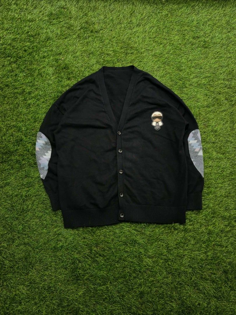 KARL LAGERFELD CARDIGAN (Category: Luxury Apparel) located in Quezon. Submitted by johh_sebastian (Listing ID 1462612770, Image 1). Description: KARL LAGERFELD CARDIGAN LIKE NEW MEASUREMENTS/DIMENSIONS width 24 length 28 no neck tag ‼️.