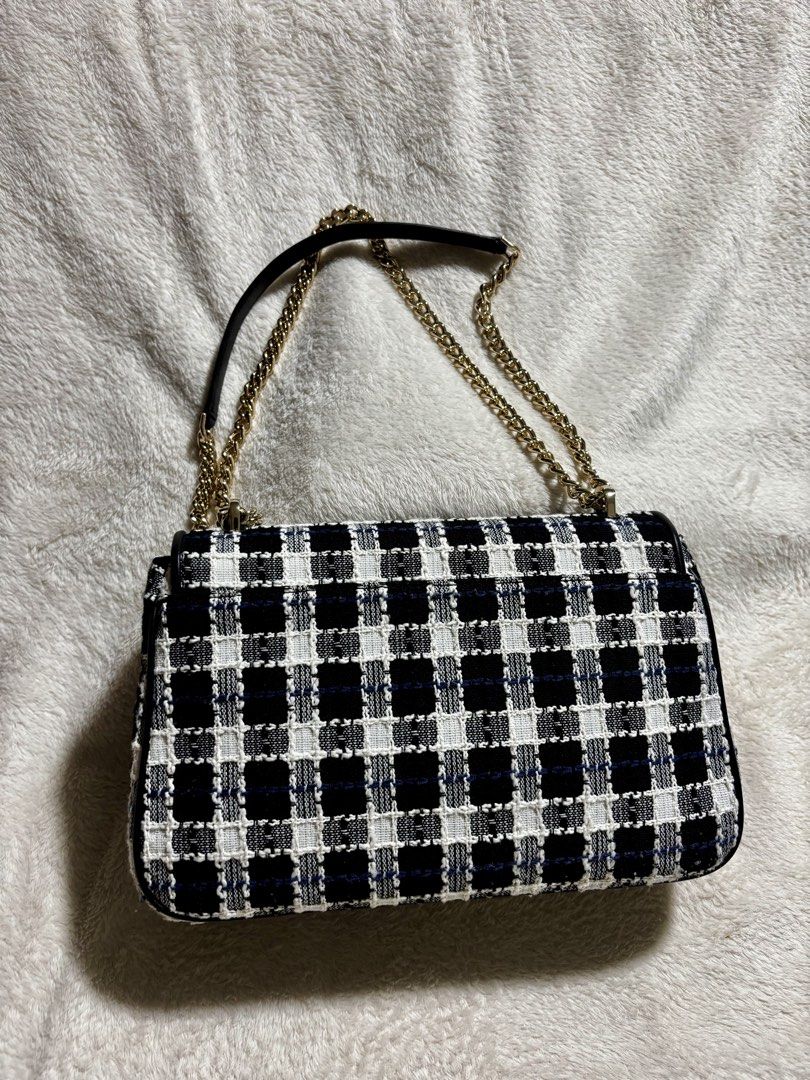Kate Spade Carey Medium Flap Shoulder Bag (Category: Luxury Bags & Wallets) located in Quezon City. Submitted by _aritan (Listing ID 1462518186, Image 2). Description: - Authentic Kate Spade shoulder bag - Stylish black and white plaid pattern RFS: di na nagagamit Loc: quezon city MOD: Lalamove / Gogo Express / Meet up @ Fishermall QC - SF shoulder by buyer MOP: GCash.