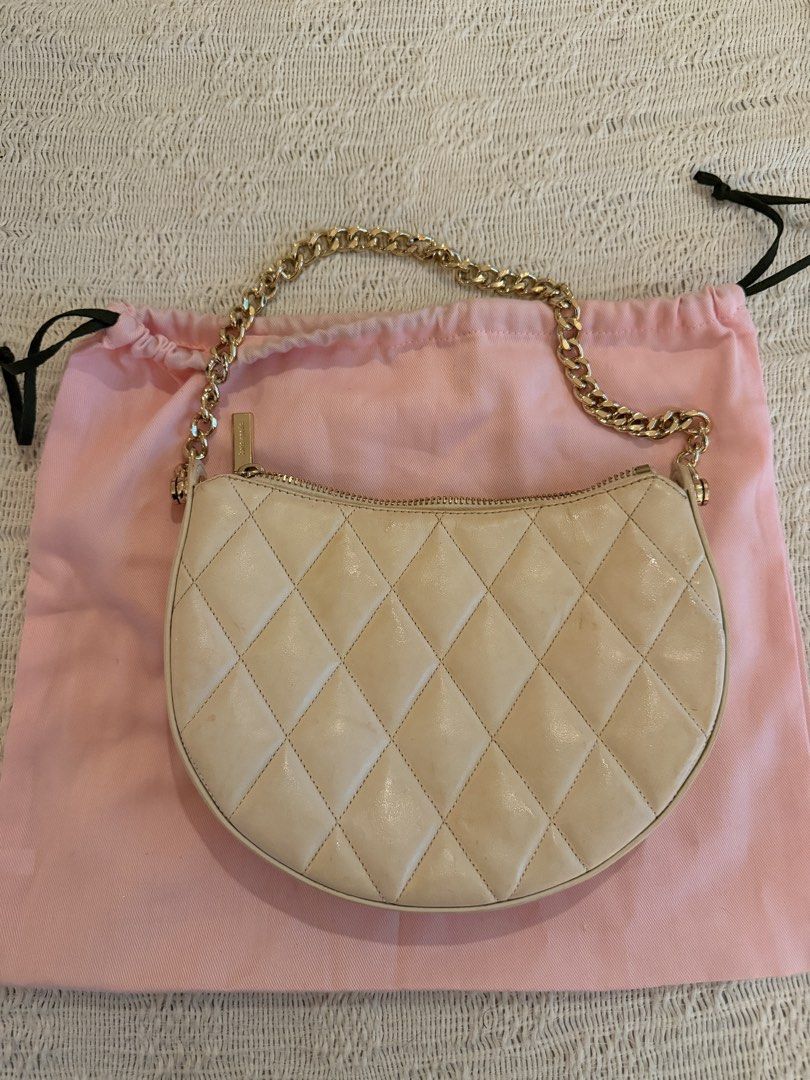 Kate Spade Quilted Leather Shoulder Bag with Chain Strap (Category: Shoulder Bags) located in Paranaque City. Submitted by izdeclutters (Listing ID 1462593033, Image 2). Description: - Brand: Kate Spade - Color: Cream Beige - Material: Quilted Leather - Strap: Gold Chain - Includes: Original Kate Spade Dust Bag .