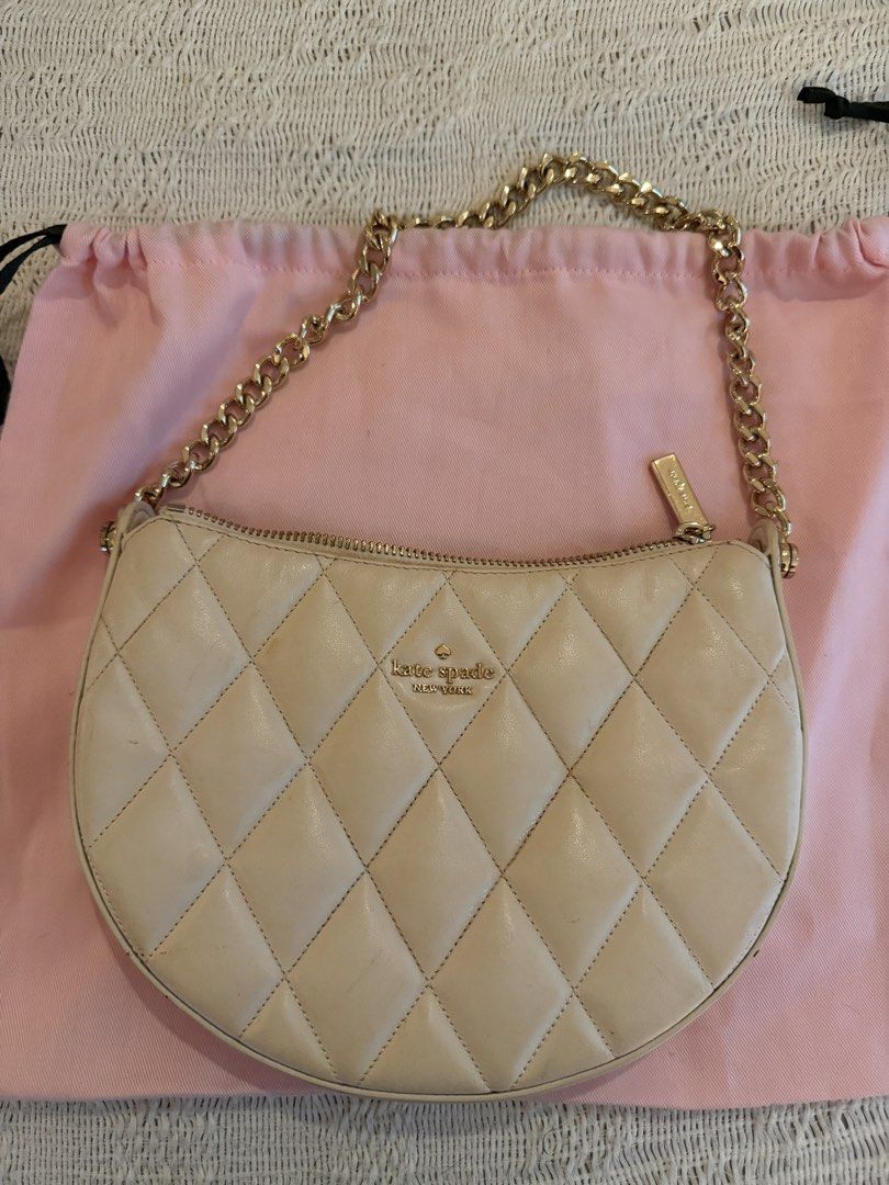 Kate Spade Quilted Leather Shoulder Bag with Chain Strap (Category: Shoulder Bags) located in Paranaque City. Submitted by izdeclutters (Listing ID 1462593033, Image 1). Description: - Brand: Kate Spade - Color: Cream Beige - Material: Quilted Leather - Strap: Gold Chain - Includes: Original Kate Spade Dust Bag .