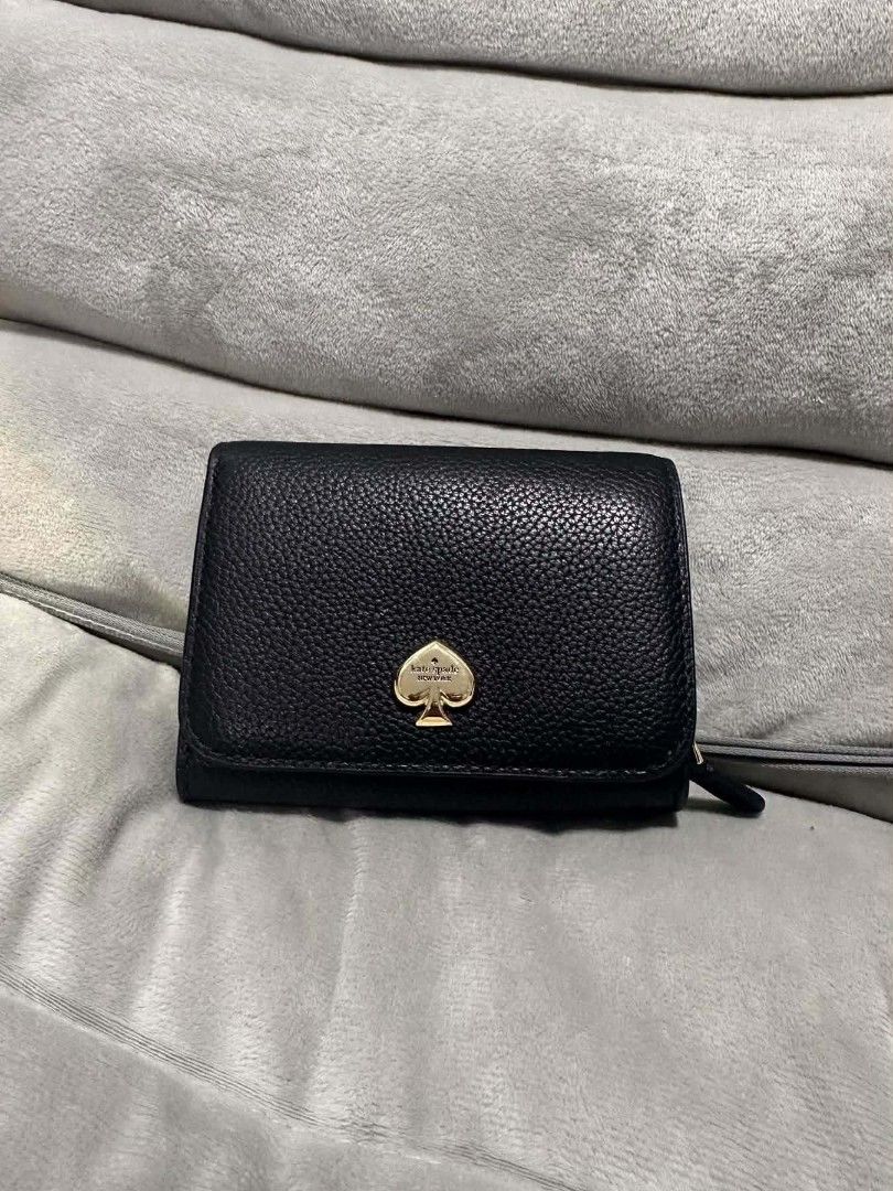 Kate spade wallet (Category: Purses & Pouches) located in Calamba. Submitted by jungk00ki3 (Listing ID 1462526994, Image 1). Description: .
