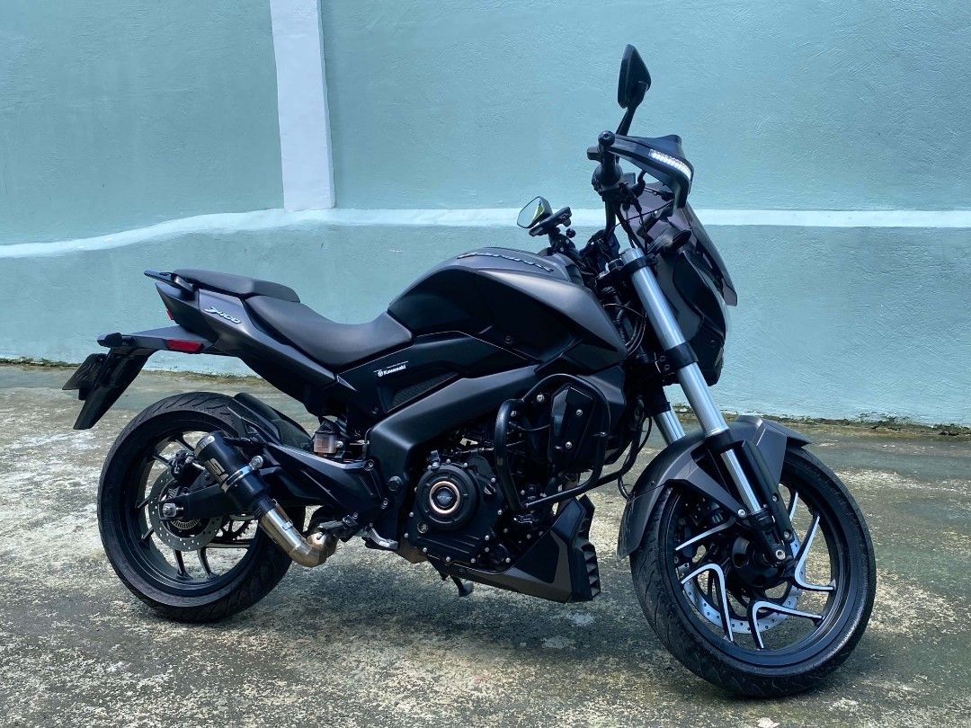 Kawasaki Dominar 400 Motorcycle (Category: Motorbikes for Sale) located in Caloocan City. Submitted by nikolaigelo (Listing ID 1462650008, Image 2). Description: Selling my Kawasaki Dominar 400. Dark grey matte finish. Has a windshield and engine guards installed. Aftermarket exhaust pipe. Low mileage, only 6446 km. Great for city rides and longer trips. Well maintained and ready for a new owner. Message me for more details..