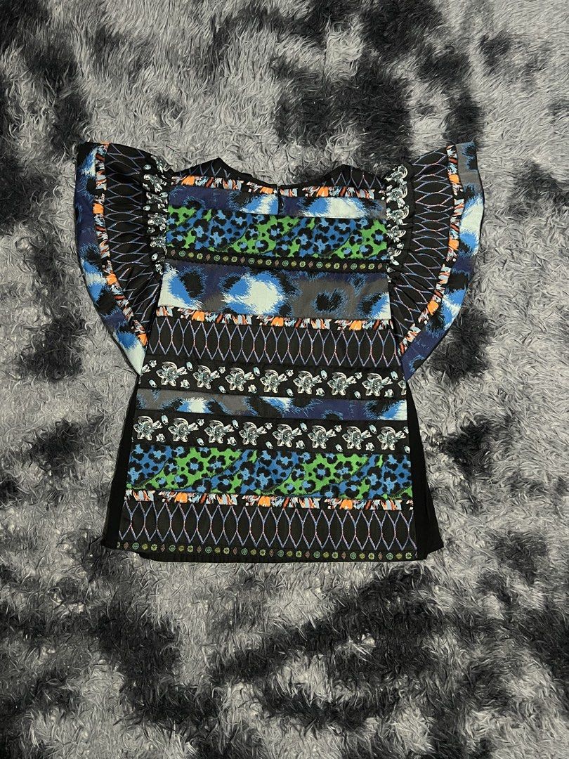 Kenzo x H&M Blouse (Category: Blouses) located in Cebu City. Submitted by drip_block (Listing ID 1462566200, Image 2). Description: Dimes 14x23.