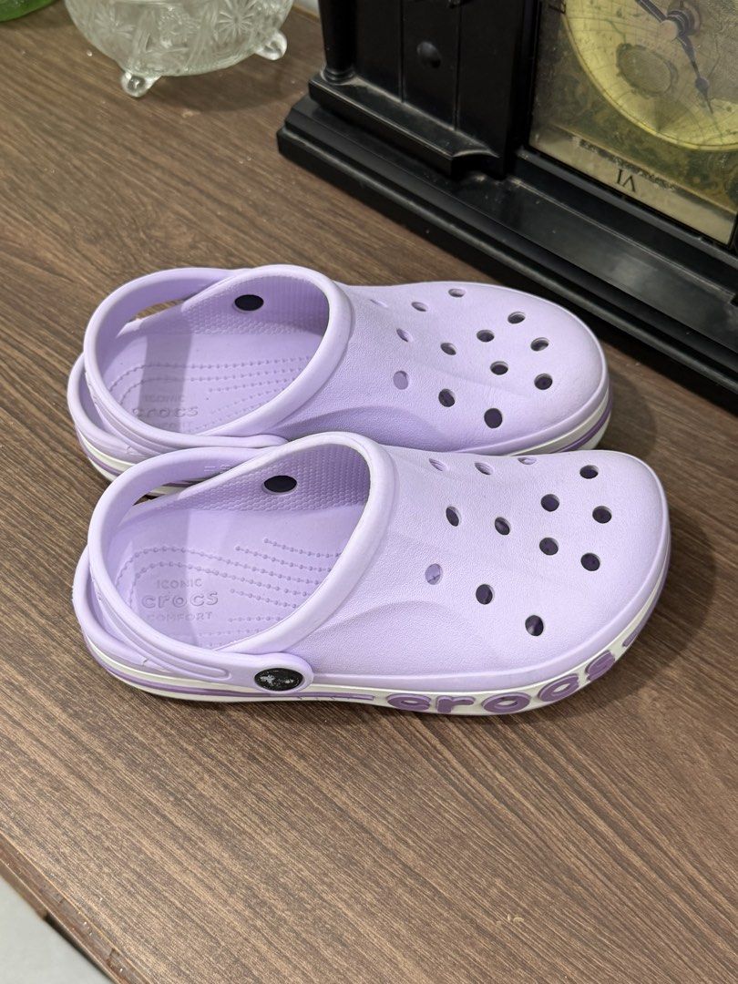 Kids' Lavender Crocs Comfort Clogs in J1 (Category: Babies & Kids Fashion) located in Binan City. Submitted by prelovedlagunaph (Listing ID 1462622639, Image 2). Description: - Light purple Crocs clogs for kids - Iconic comfort footbed - Easy slip-on style with adjustable heel strap - White and purple striped sole - Ideal for everyday wear and playtime - Grab them before they're gone!.