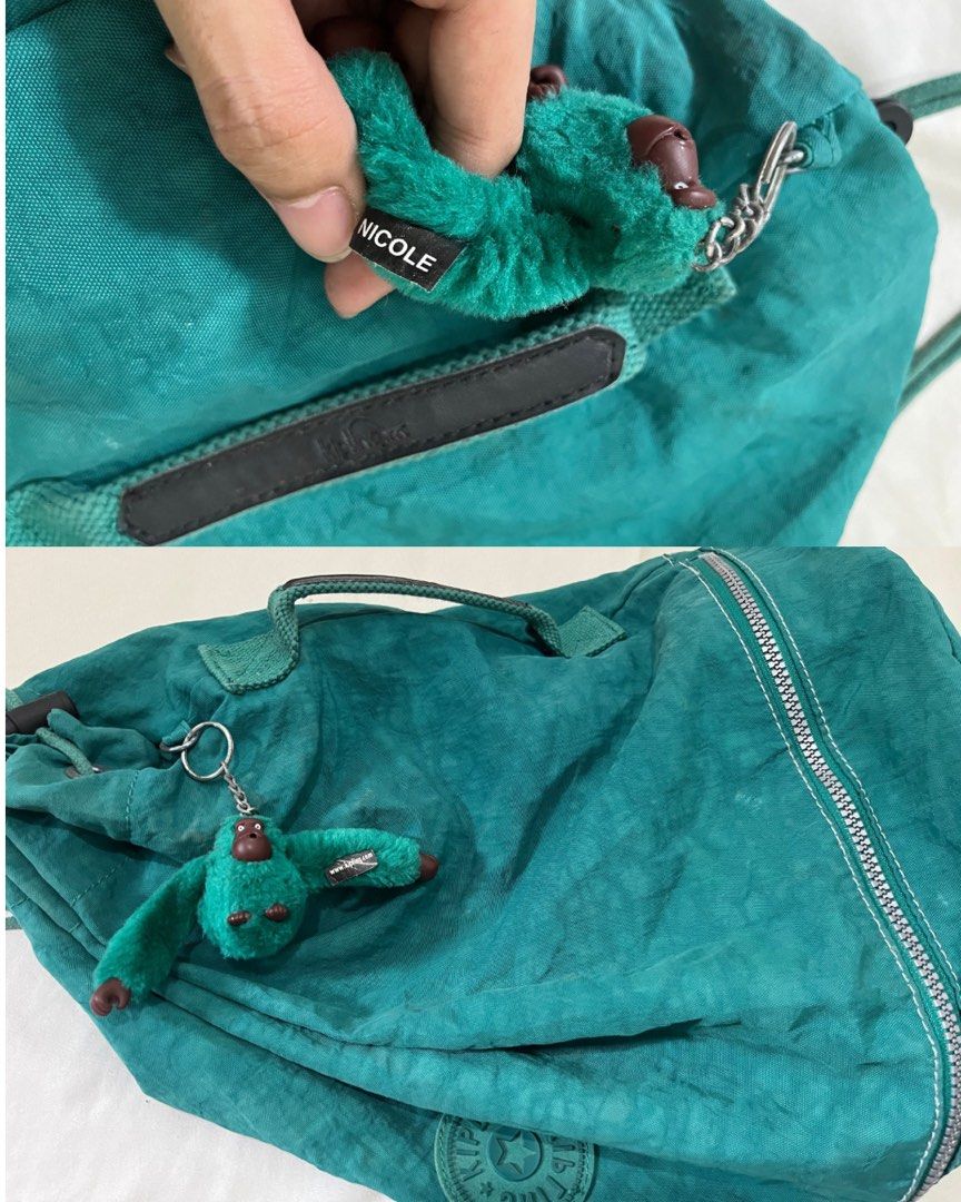 KIPLING 2 Way Bag (Category: Shoulder Bags) located in Marikina City. Submitted by dowsie.shop4divas (Listing ID 1462553714, Image 2). Description: - Brand: Kipling - Type: 2-way bag - Color: Teal - Features: Drawstring closure, signature monkey charm, durable material - Versatile: Can be worn as a shoulder bag or drawstring backpack.