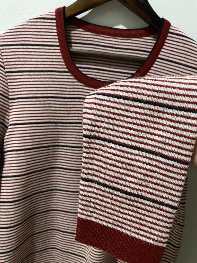 Knit long sleeve white and red stripes (Category: Longsleeves) located in Makati City. Submitted by indaysukaycloset (Listing ID 1462519389, Image 3). Description: ❤️🤍 Knit Long Sleeve - Red & White Stripe Size: Free / Medium to large ✅ Details: - Material: Wool 60% / Acrylic 40% (MATE tag) - Knit fabric, soft and warm, not makati - Color: Off-white x Maroon/Burgundy with black thin stripe - With burgundy ribbing on neck, hem, and cuffs - Good c