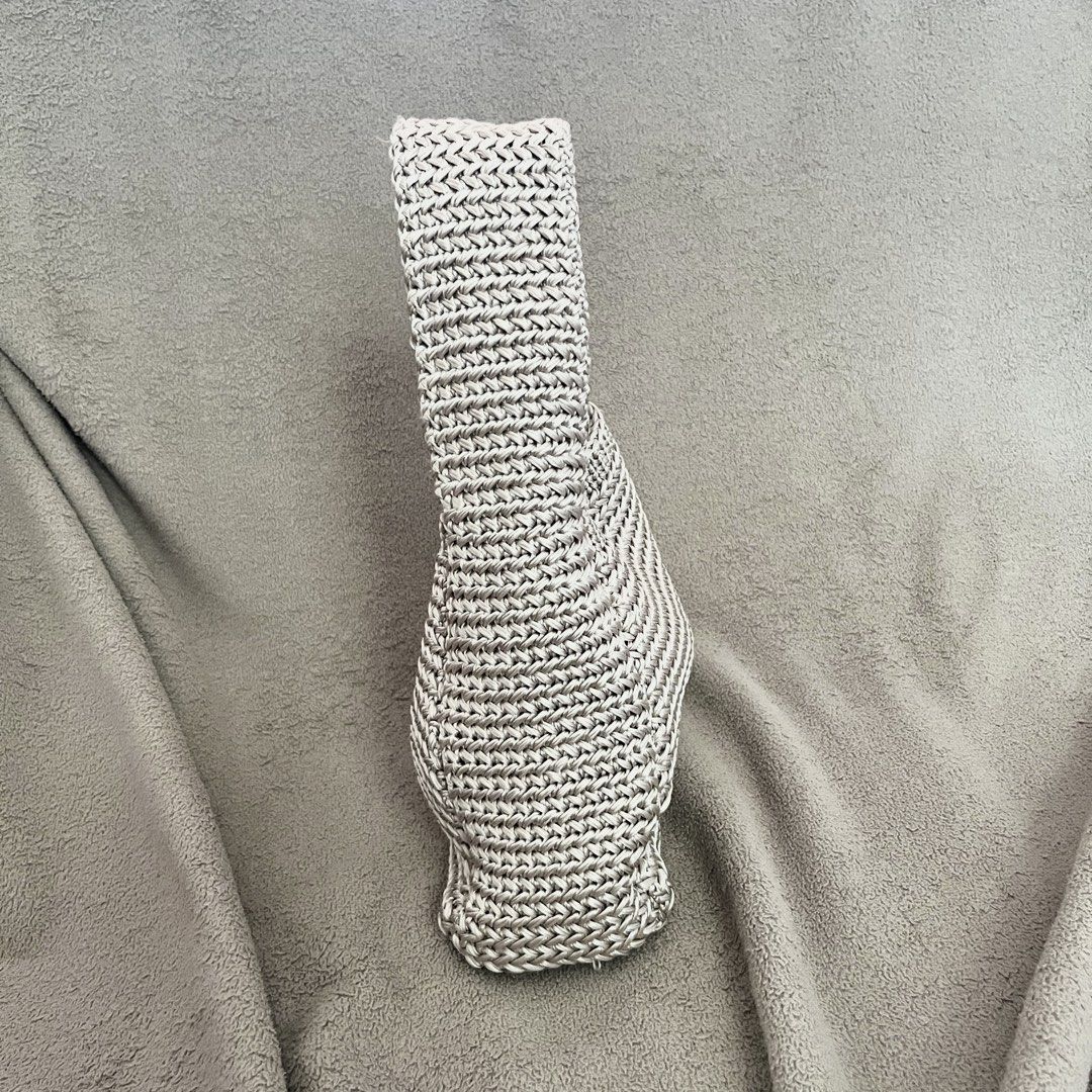 Knitted Mettalic Light Grey Chic Small Shoulder Hand Bag (Category: Tote Bags) located in Naga. Submitted by kitty_cate02 (Listing ID 1462469432, Image 3). Description: Used once In excellent condition - Cute knitted tote bag - Neutral color, matches any outfit - Magnetic snap closure inside - Perfect size for your essentials - Measures approximately 7 inches tall - Super elegant and spacious.