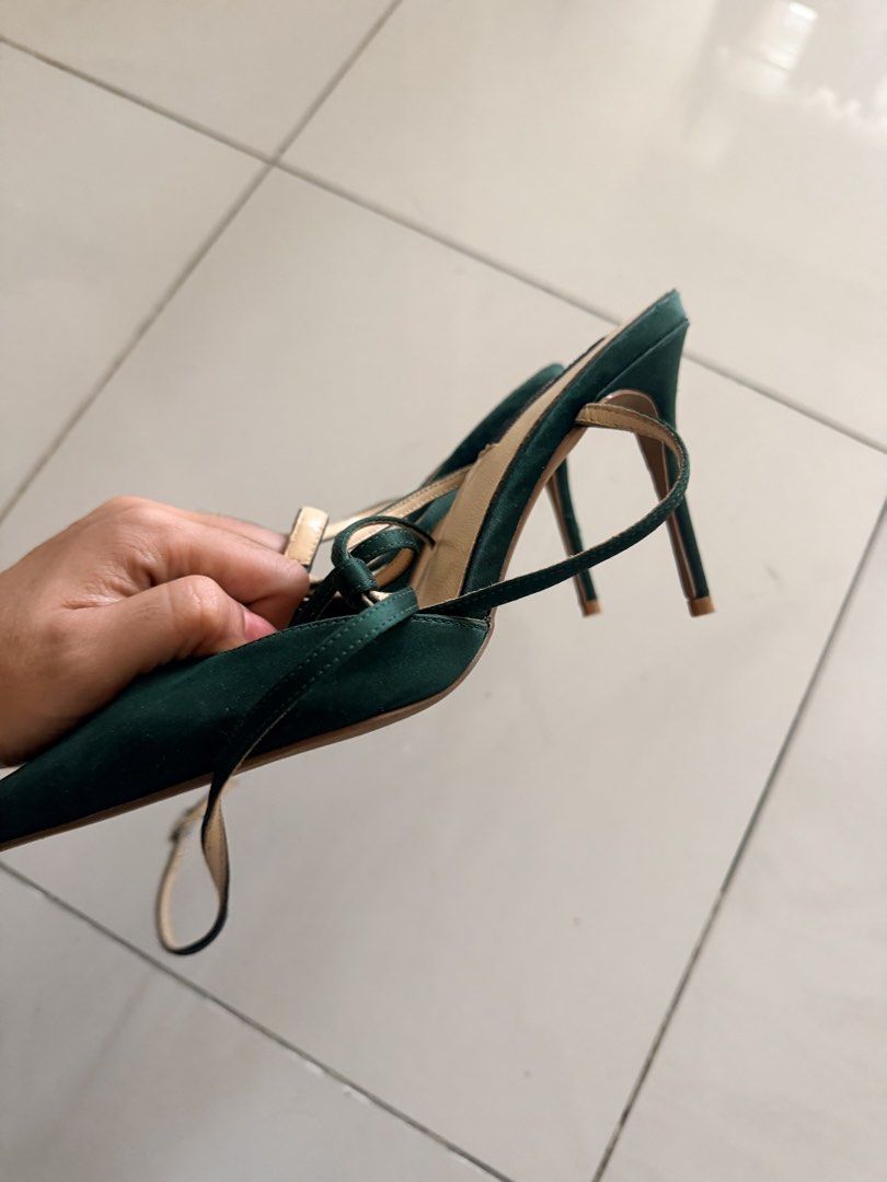 KOLLECTION Green Suede Strappy Heels Size 36 (Category: Heels) located in Caloocan City. Submitted by geemariell56161 (Listing ID 1462441132, Image 3). Description: - Brand: KOLLECTION - Color: Green - Material: Suede - Size: 36 - Features: Delicate ankle tie straps, pointed toe - Style: Dressy, perfect for elevating outfits - Reason for Selling: No longer fits - Condition: Please check photos for details.