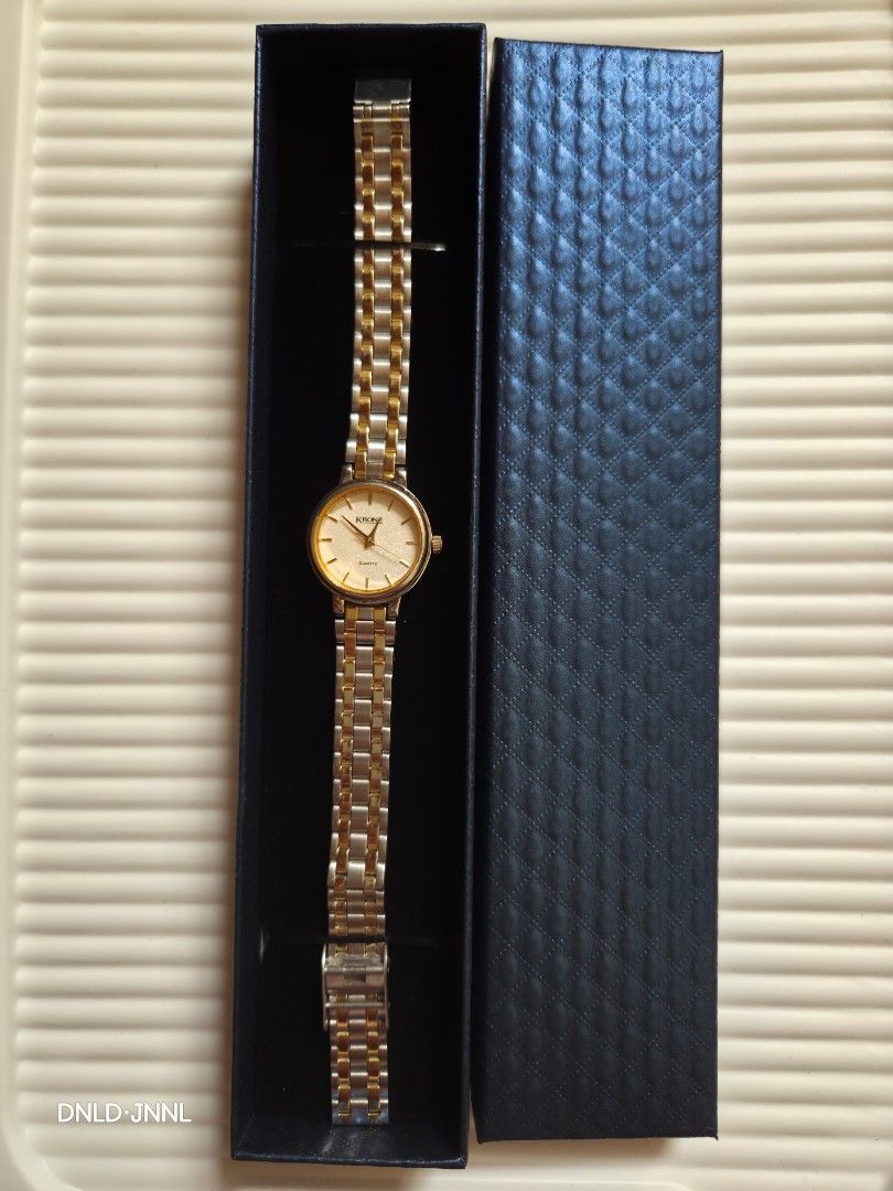 Krone Quartz Gold Tone Watch (Category: Women's Watches) located in Quezon City. Submitted by mngkybb (Listing ID 1462535859, Image 1). Description: KRONE QUARTZ WATCH P800.00 Location: Heroes Hill Subd. QC (near Fisher Mall Quezon Ave.) For inquiries, please send us a message. Reminder: You are dealing with pre-loved/vintage watches. Imperfections, signs of usage and minor flaws are part of buying. Please manage your expectations 😊 Thank yoouuu