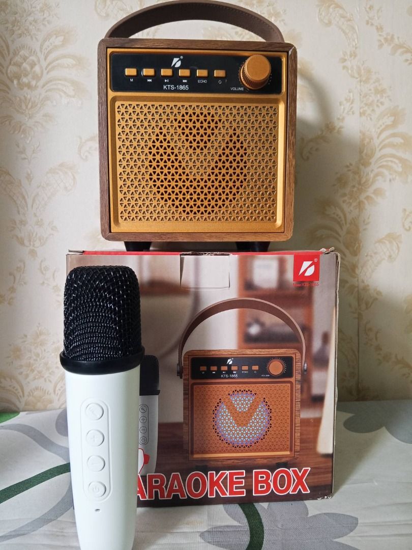 KTS-1865 Portable Karaoke Speaker and Wireless Microphone Set (Category: Soundbars, Speakers & Amplifiers) located in Paranaque City. Submitted by elmondomouit (Listing ID 1462560008, Image 2). Description: Get the party started anytime, anywhere with this KTS-1865 Portable Karaoke Speaker and Wireless Microphone Set! This retro-style speaker is perfect for home use, outdoor gatherings, or even small parties. Features: Portable design with a buil