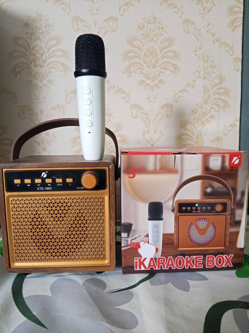 KTS-1865 Portable Karaoke Speaker and Wireless Microphone Set (Category: Soundbars, Speakers & Amplifiers) located in Paranaque City. Submitted by elmondomouit (Listing ID 1462560008, Image 3). Description: Get the party started anytime, anywhere with this KTS-1865 Portable Karaoke Speaker and Wireless Microphone Set! This retro-style speaker is perfect for home use, outdoor gatherings, or even small parties. Features: Portable design with a buil