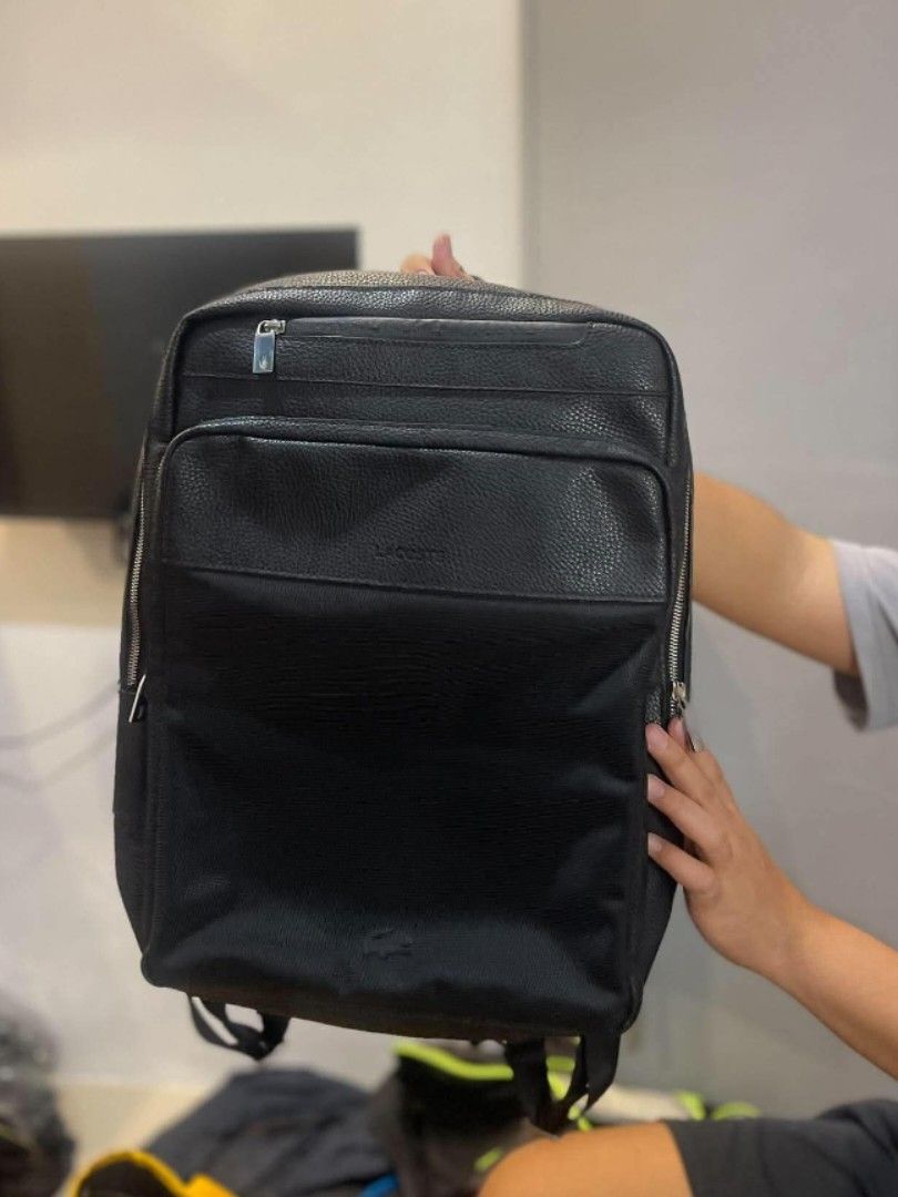 Lacoste Black Leather & Nylon Backpack (Category: Backpacks) located in Manila. Submitted by louiefinds26 (Listing ID 1462605062, Image 1). Description: Lacoste authentic Leather Newly Arrival .