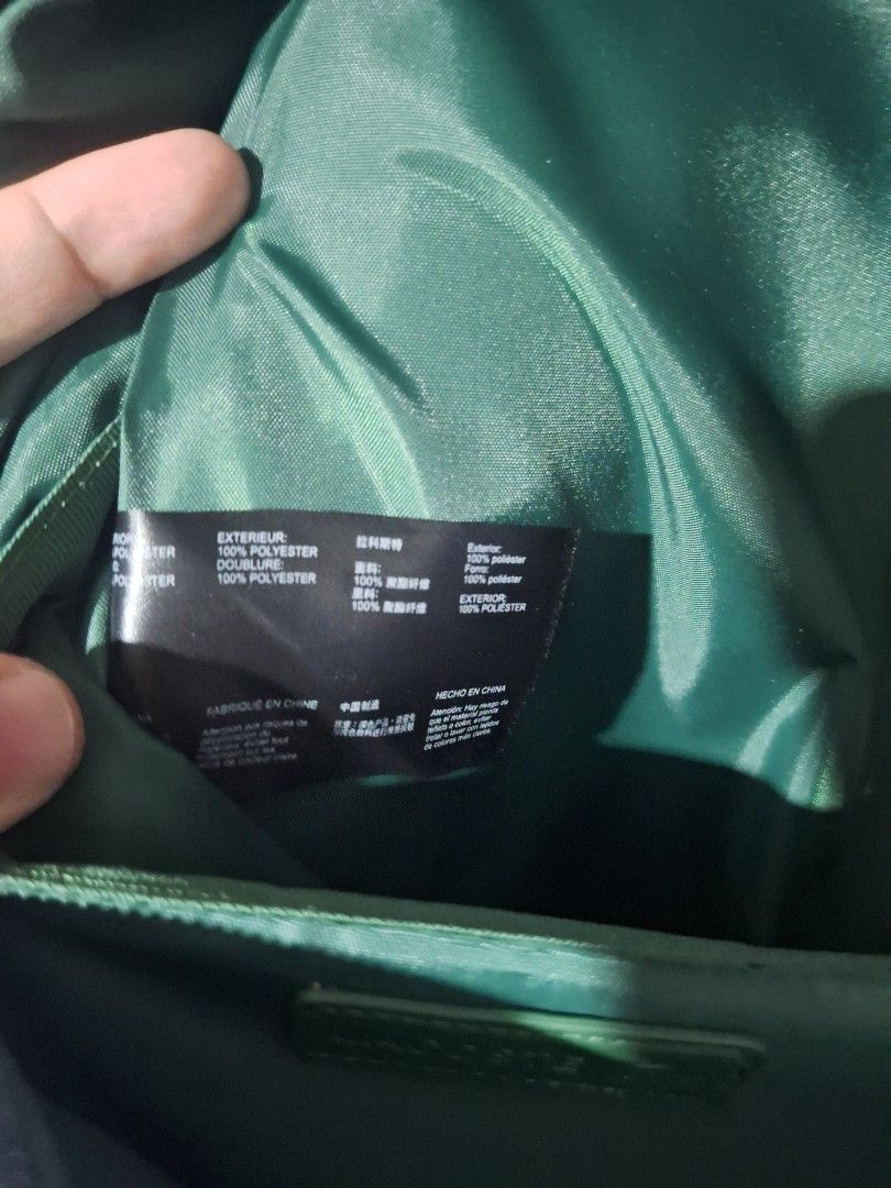 Lacoste Blue Neocroc Backpack (Category: Luxury Bags & Wallets) located in Paranaque City. Submitted by sneakyfied (Listing ID 1462536169, Image 3). Description: Bag only no inclusions 100% Authentic with Laptop compartment inside RFS: just Graduated, no longer going to use it.
