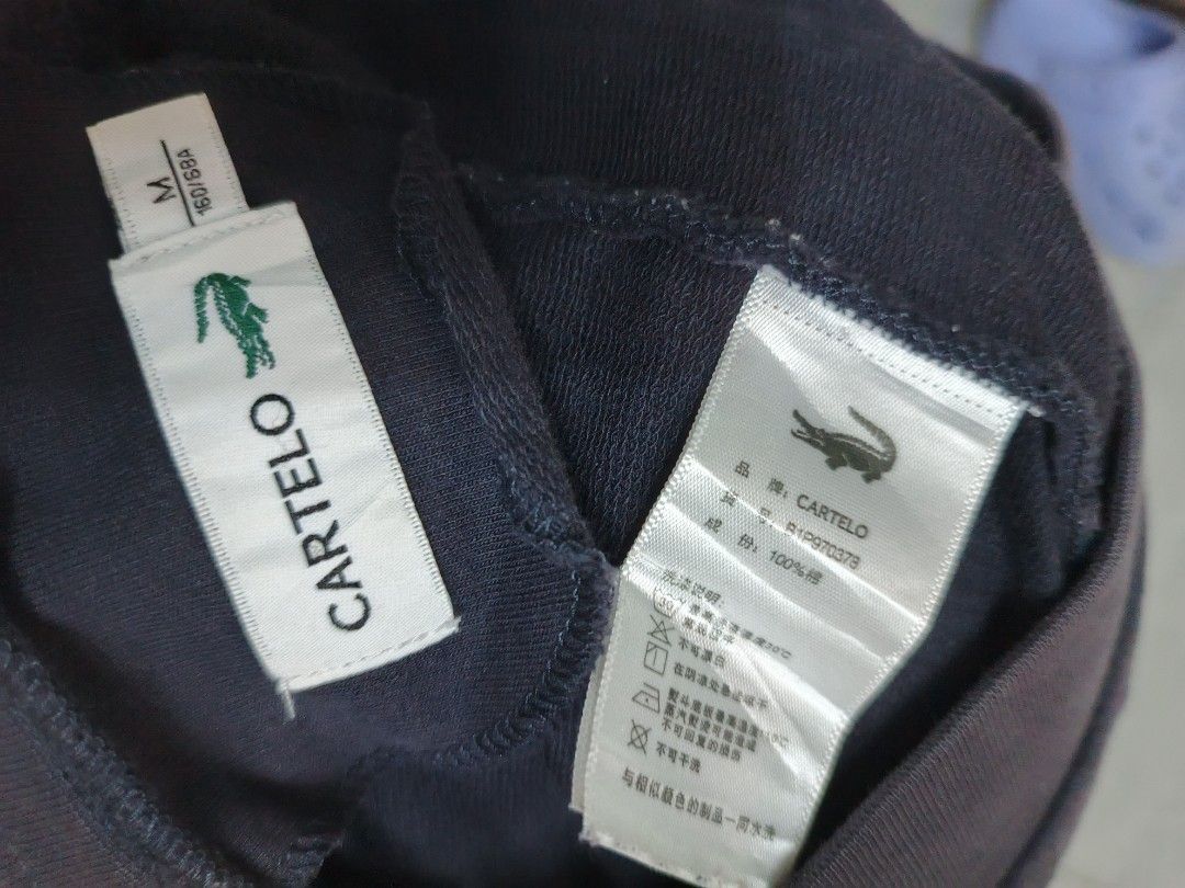 Lacoste Dark Grey Sweatpants Size M (Category: Jeans) located in Bulacan. Submitted by gratsy (Listing ID 1462451510, Image 2). Description: - Brand: Lacoste - Color: Dark Grey - Material: 100% Cotton - Features: Elastic waistband with drawstring, two side pockets - Size: M (fits 160/68A) - Ideal for: Lounging, casual wear.