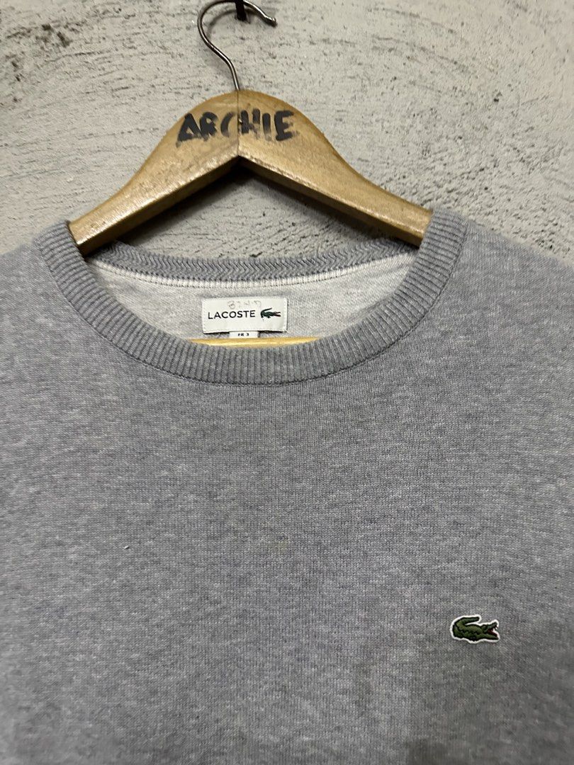 Lacoste Grey Crewneck Sweater (Category: Coats, Jackets and Outerwear) located in Quezon City. Submitted by stre3tw3ar (Listing ID 1462614722, Image 2). Description: - Brand: Lacoste - Color: Grey - Style: Crewneck Sweater - Logo: Iconic green crocodile on chest - Material: 100% Cotton - Size: FR 3 / US S - Perfect for: Everyday wear.
