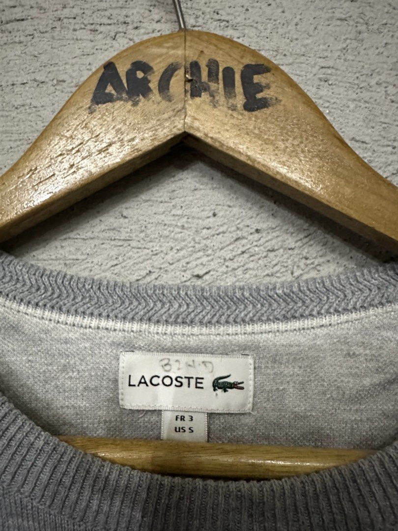 Lacoste Grey Crewneck Sweater (Category: Coats, Jackets and Outerwear) located in Quezon City. Submitted by stre3tw3ar (Listing ID 1462614722, Image 3). Description: - Brand: Lacoste - Color: Grey - Style: Crewneck Sweater - Logo: Iconic green crocodile on chest - Material: 100% Cotton - Size: FR 3 / US S - Perfect for: Everyday wear.