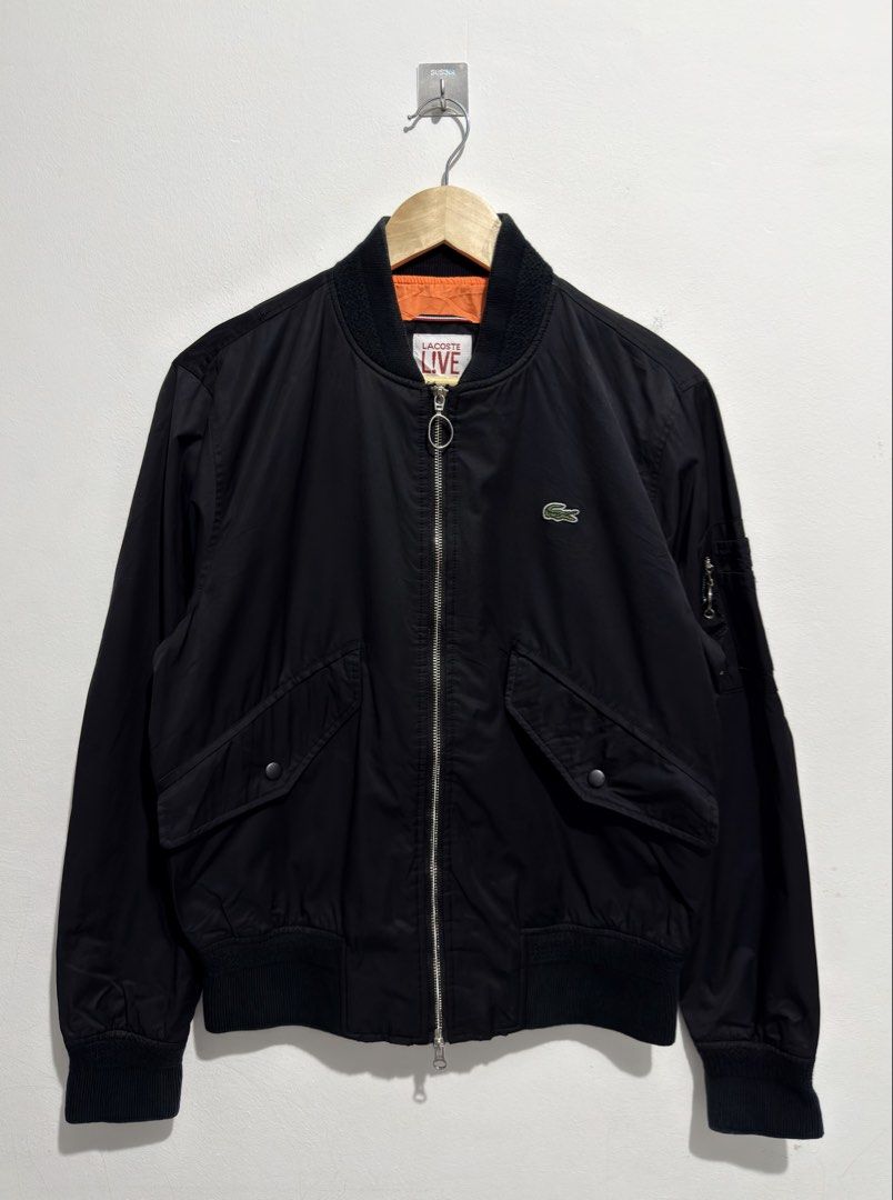 Lacoste Live MA-1 Bomber Jacket 💯 Authentic (Category: Coats, Jackets and Outerwear) located in Los Banos. Submitted by davidabeg15504 (Listing ID 1462599129, Image 1). Description: Size 48 Condition: Excellent Condition Width: 21 Length: 26 Price: 2980 Freeshipping 📥.