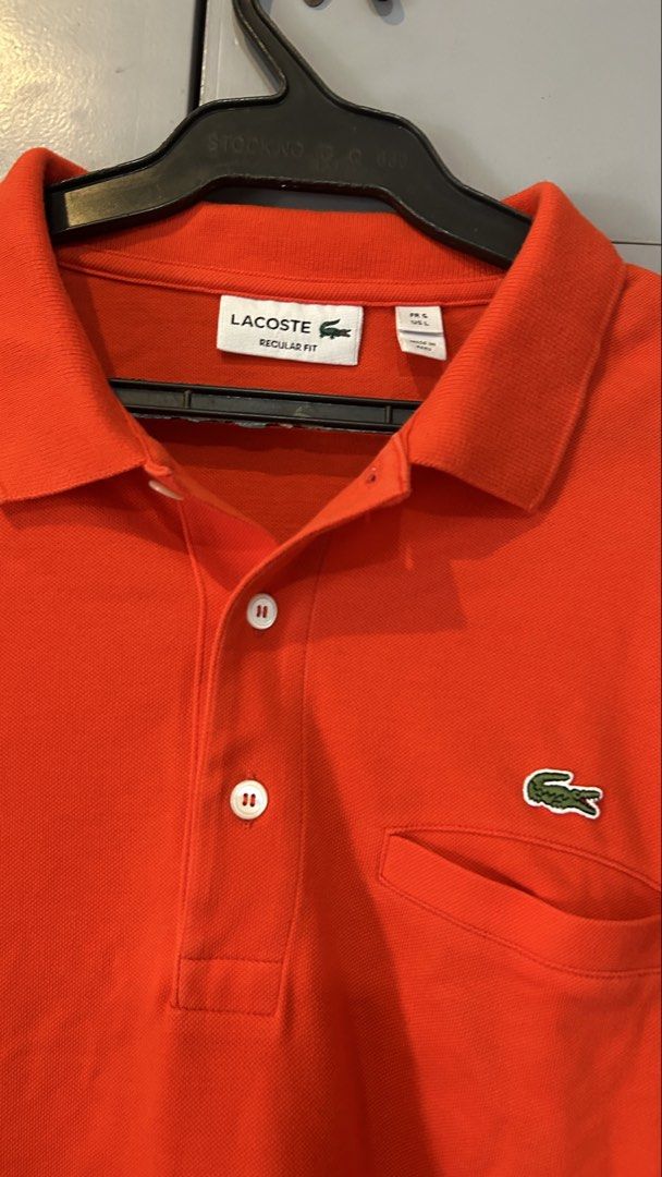 Lacoste Polo Shirt (Category: Tshirts & Polo Shirts ) located in Manila. Submitted by jewelcaps (Listing ID 1462460328, Image 2). Description: Declutterring ALL ORIGINAL Lacoste Regular fit Polo Shirt w/ Pocket “Red-Orange” Size: L (19x27) Condition: 9/10 1350 pesos only! Additional fee for shipping via Lalamove/Grab, and J&T for outside Metro Manila.