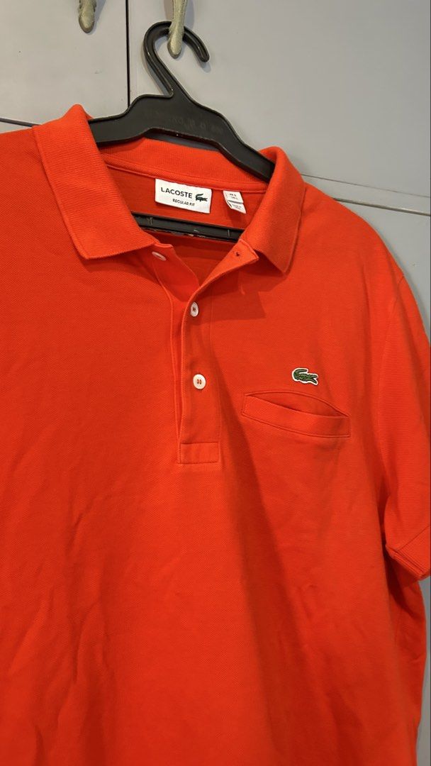 Lacoste Polo Shirt (Category: Tshirts & Polo Shirts ) located in Manila. Submitted by jewelcaps (Listing ID 1462460328, Image 1). Description: Declutterring ALL ORIGINAL Lacoste Regular fit Polo Shirt w/ Pocket “Red-Orange” Size: L (19x27) Condition: 9/10 1350 pesos only! Additional fee for shipping via Lalamove/Grab, and J&T for outside Metro Manila.