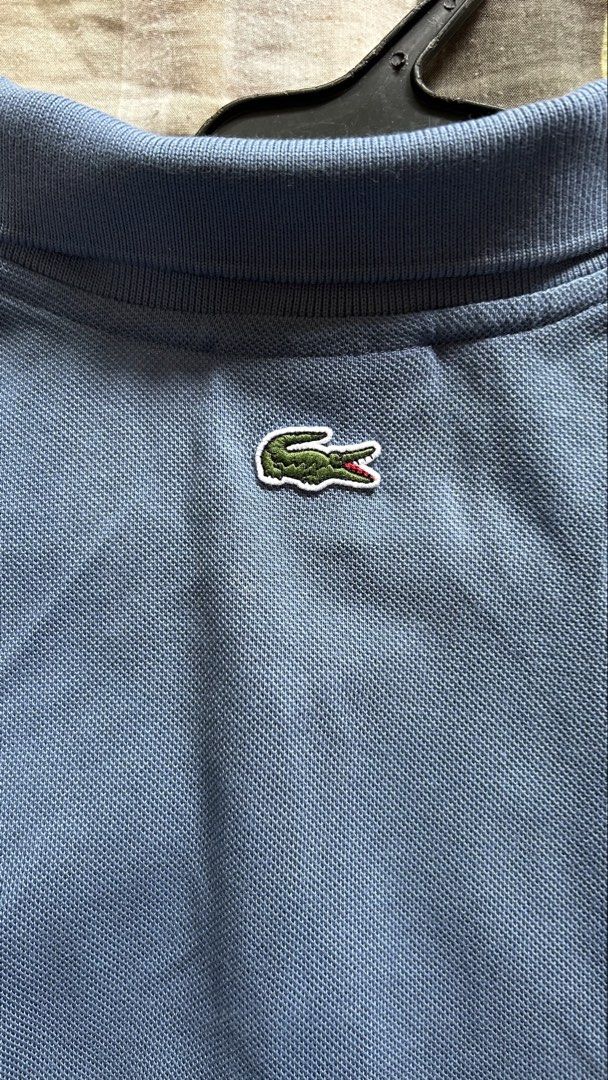 Lacoste Polo Shirt (Category: Tshirts & Polo Shirts ) located in Manila. Submitted by jewelcaps (Listing ID 1462461444, Image 2). Description: Declutterring ALL ORIGINAL Lacoste Slim fit Polo Shirt with mesh Logo “Blue” Size: L (20x27) Condition: 9.5/10 1500 pesos only! Additional fee for shipping via Lalamove/Grab, and J&T for outside Metro Manila.