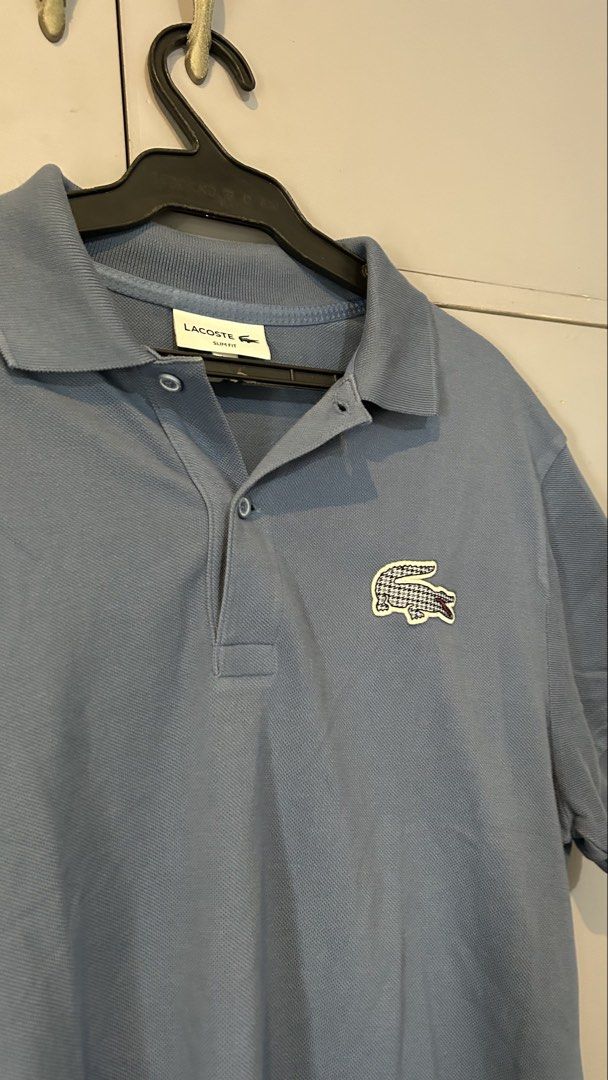 Lacoste Polo Shirt (Category: Tshirts & Polo Shirts ) located in Manila. Submitted by jewelcaps (Listing ID 1462461444, Image 1). Description: Declutterring ALL ORIGINAL Lacoste Slim fit Polo Shirt with mesh Logo “Blue” Size: L (20x27) Condition: 9.5/10 1500 pesos only! Additional fee for shipping via Lalamove/Grab, and J&T for outside Metro Manila.