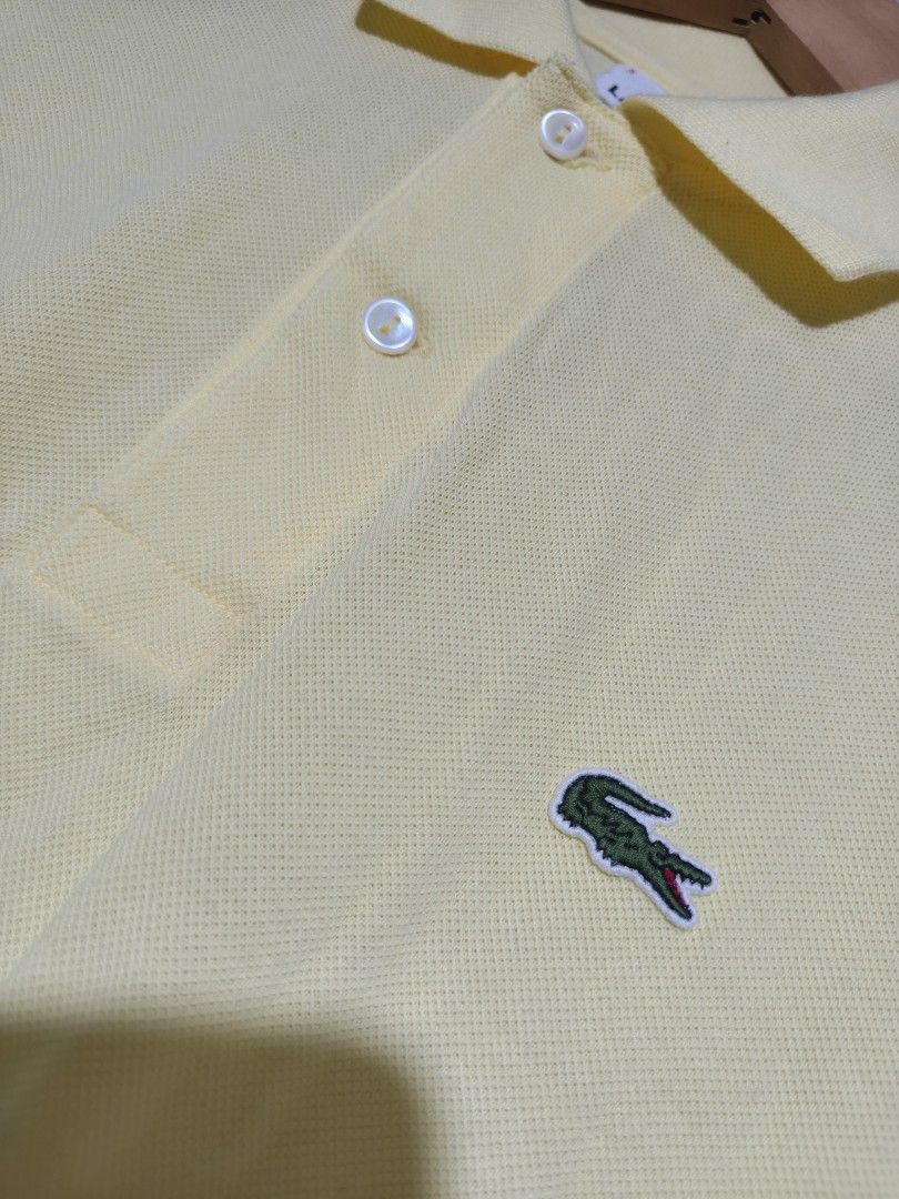 LACOSTE POLO SHIRT YELLOW (Category: Tshirts & Polo Shirts ) located in Tacloban City. Submitted by tactripp (Listing ID 1462456825, Image 2). Description: Auth/Orig w - 18.5 to 19 L - 26 Excellent No issue.