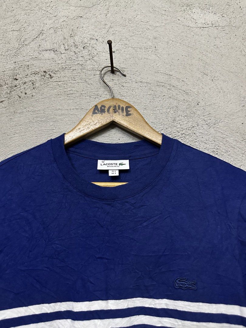 Lacoste Regular Fit Striped T-Shirt (Category: Tshirts & Polo Shirts ) located in Quezon City. Submitted by stre3tw3ar (Listing ID 1462613041, Image 2). Description: - Classic blue Lacoste t-shirt - White horizontal stripes on chest and lower half - Small embroidered crocodile logo on chest - Made in Colombia - Size: FR 3 / US S.