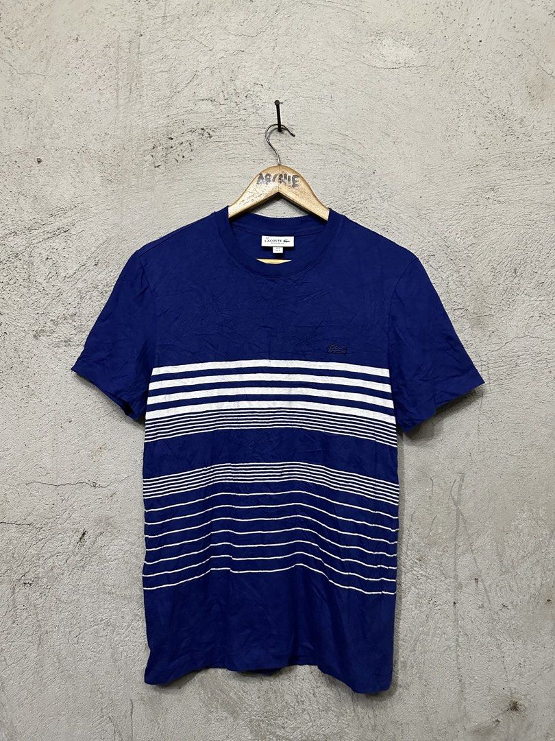 Lacoste Regular Fit Striped T-Shirt (Category: Tshirts & Polo Shirts ) located in Quezon City. Submitted by stre3tw3ar (Listing ID 1462613041, Image 1). Description: - Classic blue Lacoste t-shirt - White horizontal stripes on chest and lower half - Small embroidered crocodile logo on chest - Made in Colombia - Size: FR 3 / US S.