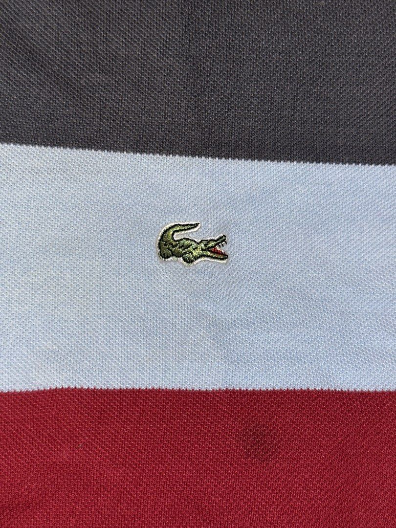 Lacoste Striped Polo Shirt (Category: Tshirts & Polo Shirts ) located in Quezon City. Submitted by mancave_stuff (Listing ID 1462483528, Image 3). Description: - Classic Lacoste polo shirt -Color rate: 9.5/10 - Horizontal stripe design - Iconic embroidered crocodile logo on chest - Made in France - Tag size: 5 (20 x 26) - Ideal for casual wear -No issue.