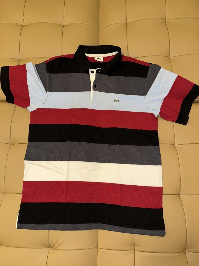 Lacoste Striped Polo Shirt (Category: Tshirts & Polo Shirts ) located in Quezon City. Submitted by mancave_stuff (Listing ID 1462483528, Image 1). Description: - Classic Lacoste polo shirt -Color rate: 9.5/10 - Horizontal stripe design - Iconic embroidered crocodile logo on chest - Made in France - Tag size: 5 (20 x 26) - Ideal for casual wear -No issue.