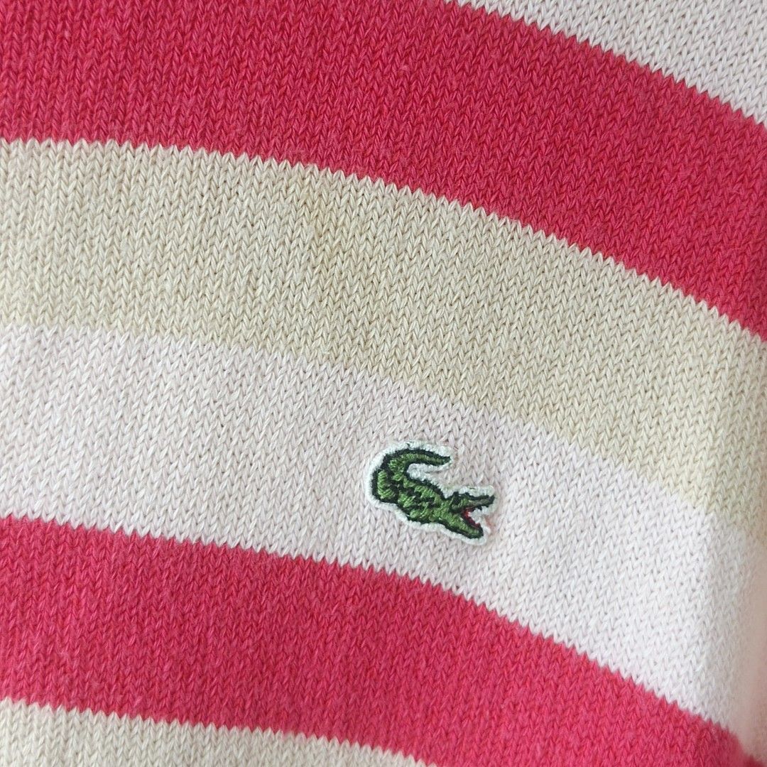 Lacoste Striped Sweater Long Sleeve Size 38 (Category: Longsleeves) located in Pasig City. Submitted by prelovedbym33 (Listing ID 1462459758, Image 2). Description: - Classic Lacoste sweater - Red and cream all-over stripes - Long sleeves - Iconic crocodile logo on chest - Made in France - Size 38 - Great for casual wear.