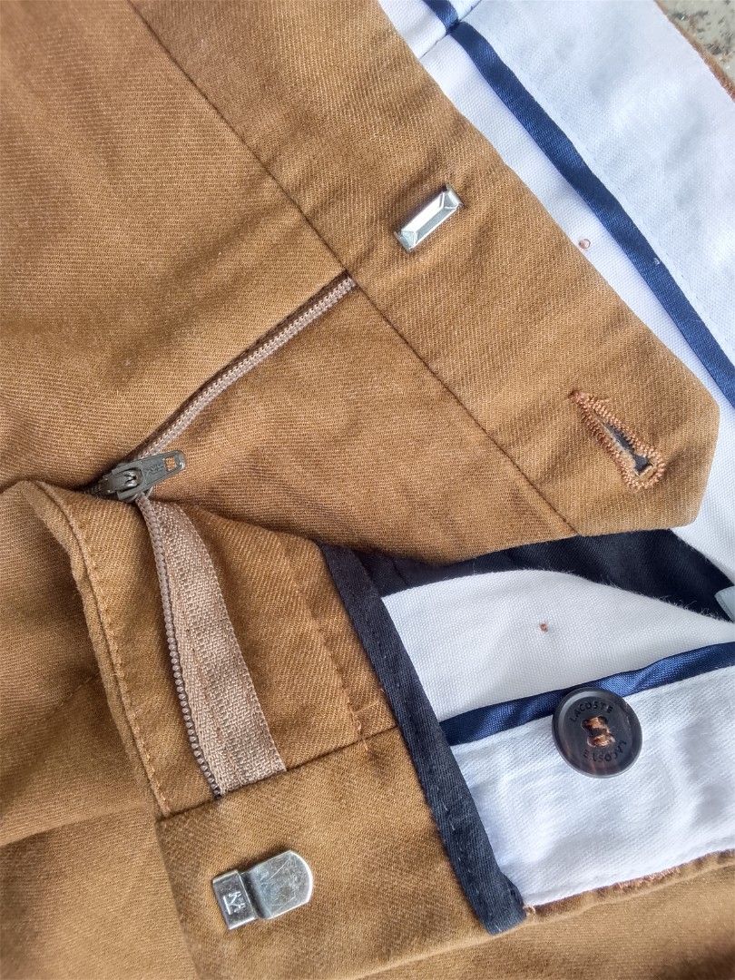 LACOSTE TAPERED CHINO PANTS (Category: Chinos) located in Manila. Submitted by saiintthrift (Listing ID 1462528067, Image 3). Description: Condition: As New Size: 40.8 x 16.3 Color rate: 11/10 NO ISSUE ig: saiintthrift fb: Saiint Thrift tiktok: saiint.thrift carousell: saiintthrift 980 + sf.