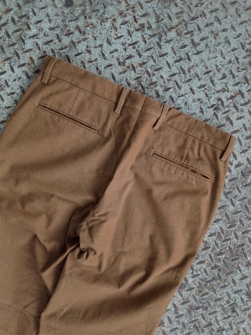 LACOSTE TAPERED CHINO PANTS (Category: Chinos) located in Manila. Submitted by saiintthrift (Listing ID 1462528067, Image 2). Description: Condition: As New Size: 40.8 x 16.3 Color rate: 11/10 NO ISSUE ig: saiintthrift fb: Saiint Thrift tiktok: saiint.thrift carousell: saiintthrift 980 + sf.