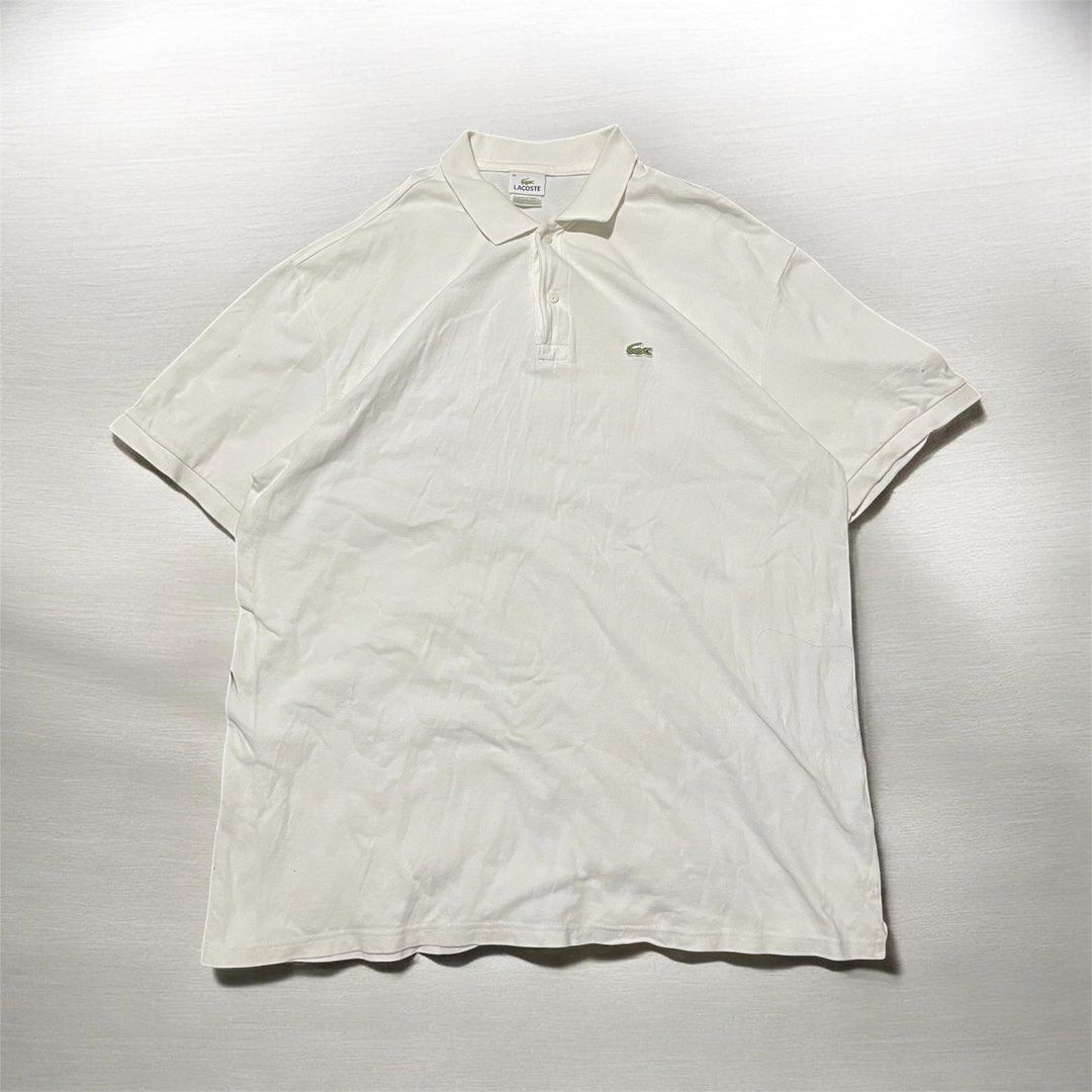 Lacoste White Polo Shirt Size 10 (Category: Tshirts & Polo Shirts ) located in Munoz. Submitted by bb_jimbo0 (Listing ID 1462624969, Image 1). Description: - Classic white Lacoste polo shirt - Iconic crocodile logo on chest - Made in Peru - Size 10 - Versatile for casual or smart-casual outfits - Timeless and simple design.